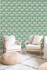 cozy living room soft armchairs pillows painted cottage floral wall decor