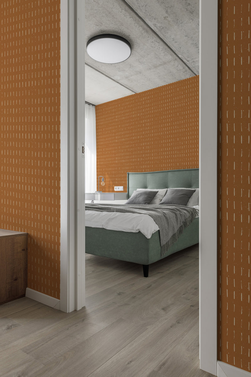 modern bedroom cushions concrete ceiling terracotta brush strokes accent wall