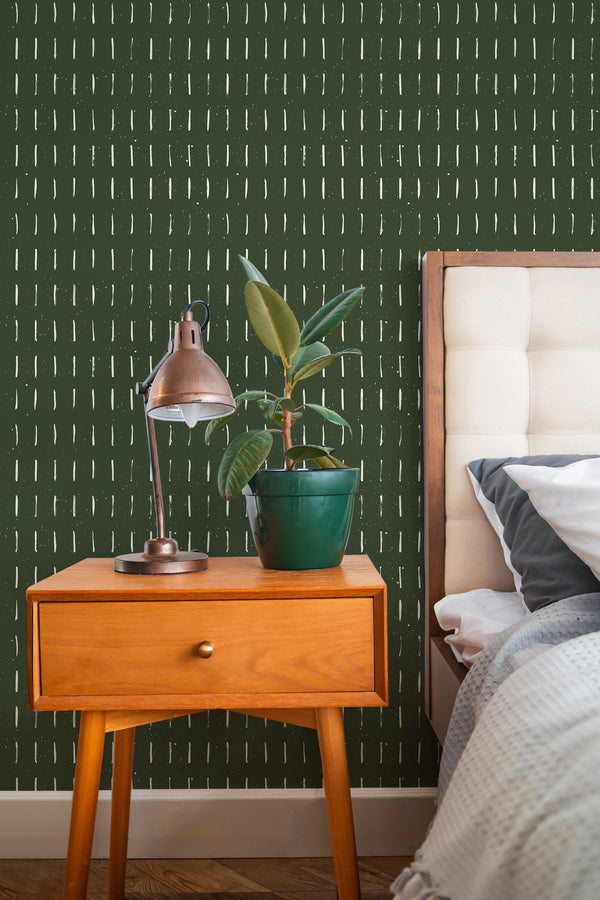 stylish bedroom interior nightstand plant lamp earthy green brush strokes accent wall