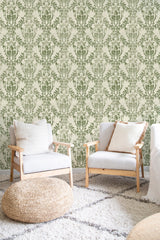 cozy living room soft armchairs pillows earthy damask wall decor