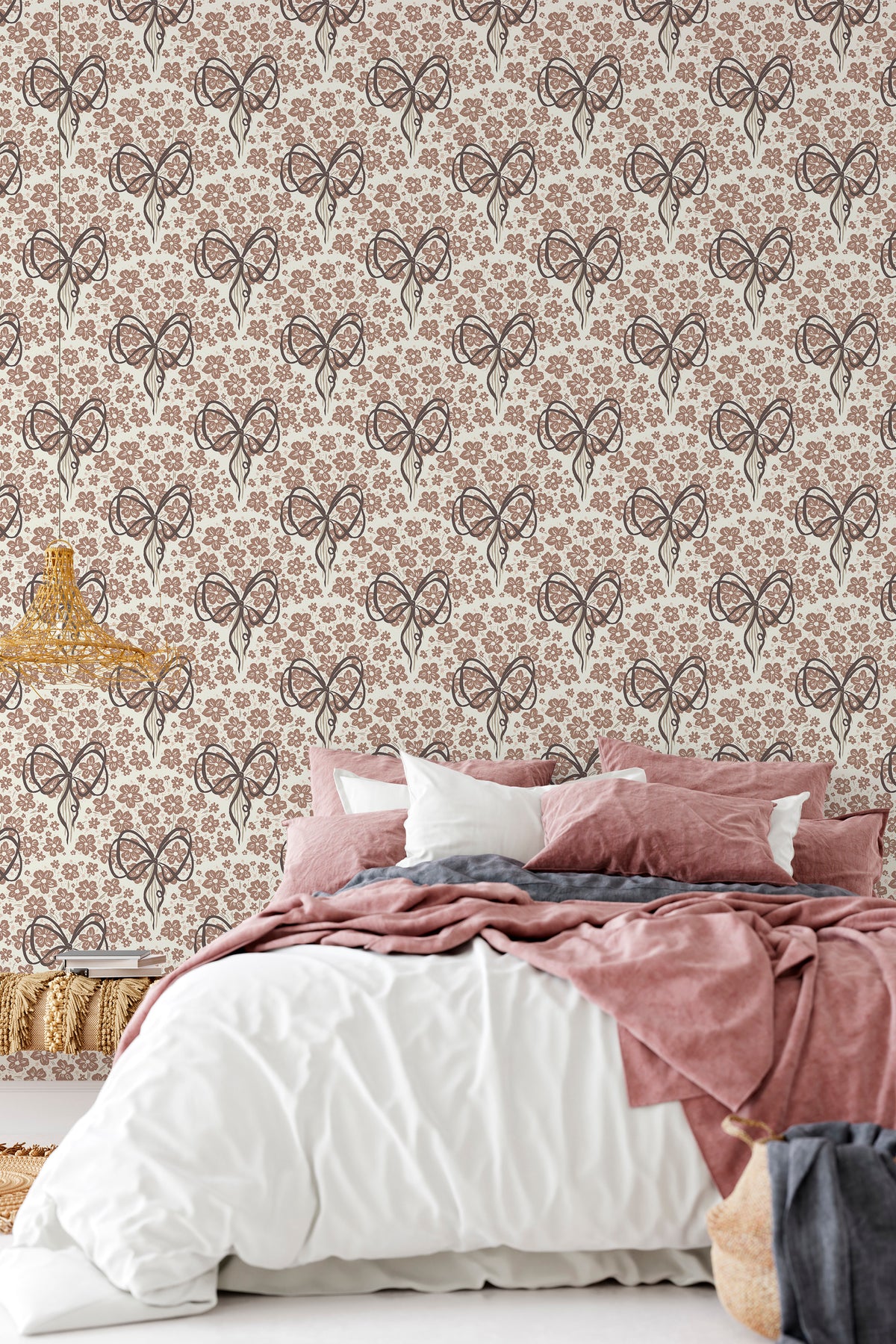 Playful Floral Bows peel and stick wallpaper is shown across a bedroom wall with brown bow motifs over a small floral background.