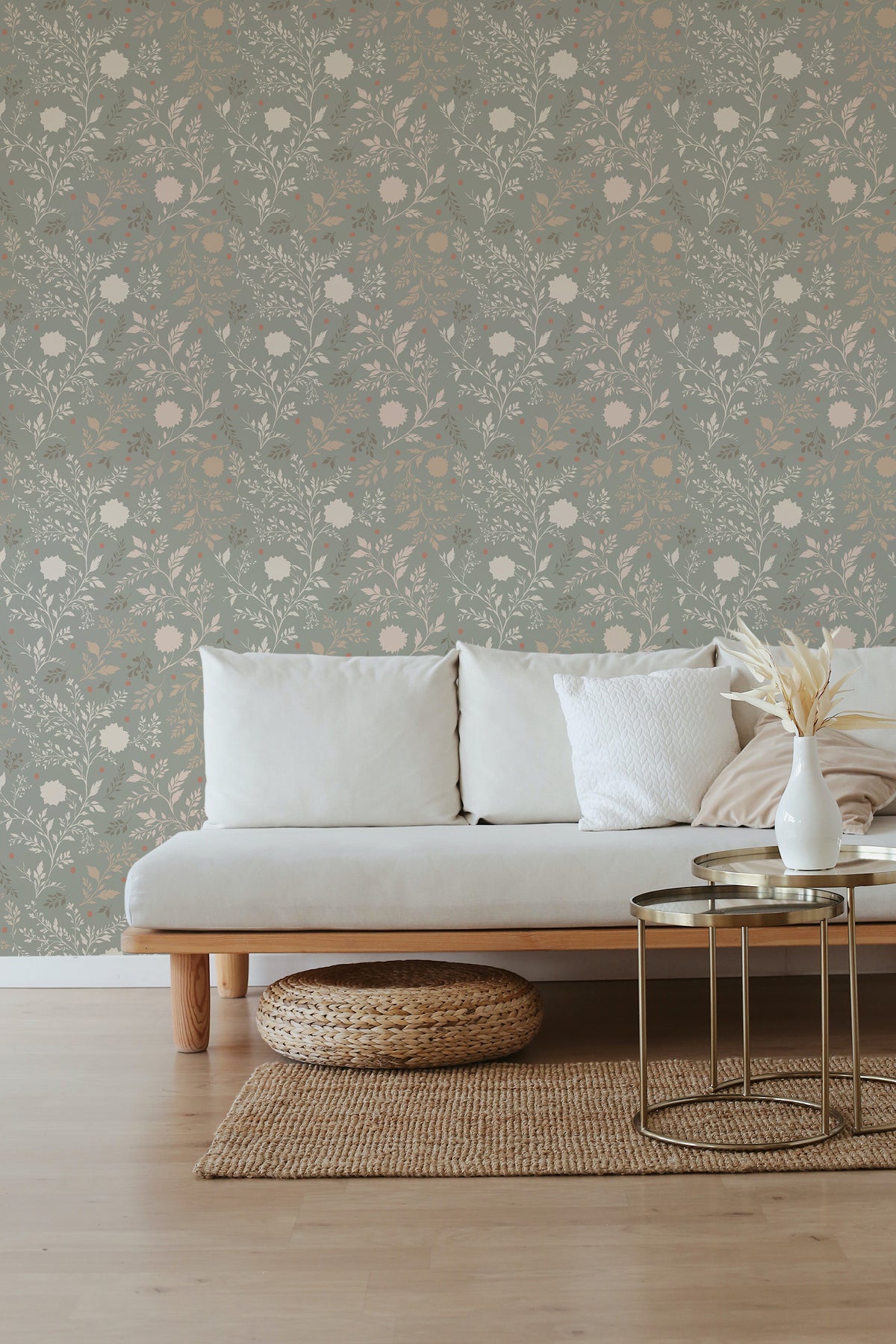 Delicate Floral Sprigs peel and stick wallpaper in a living room, shown across a full wall with an airy leafy floral repeat.