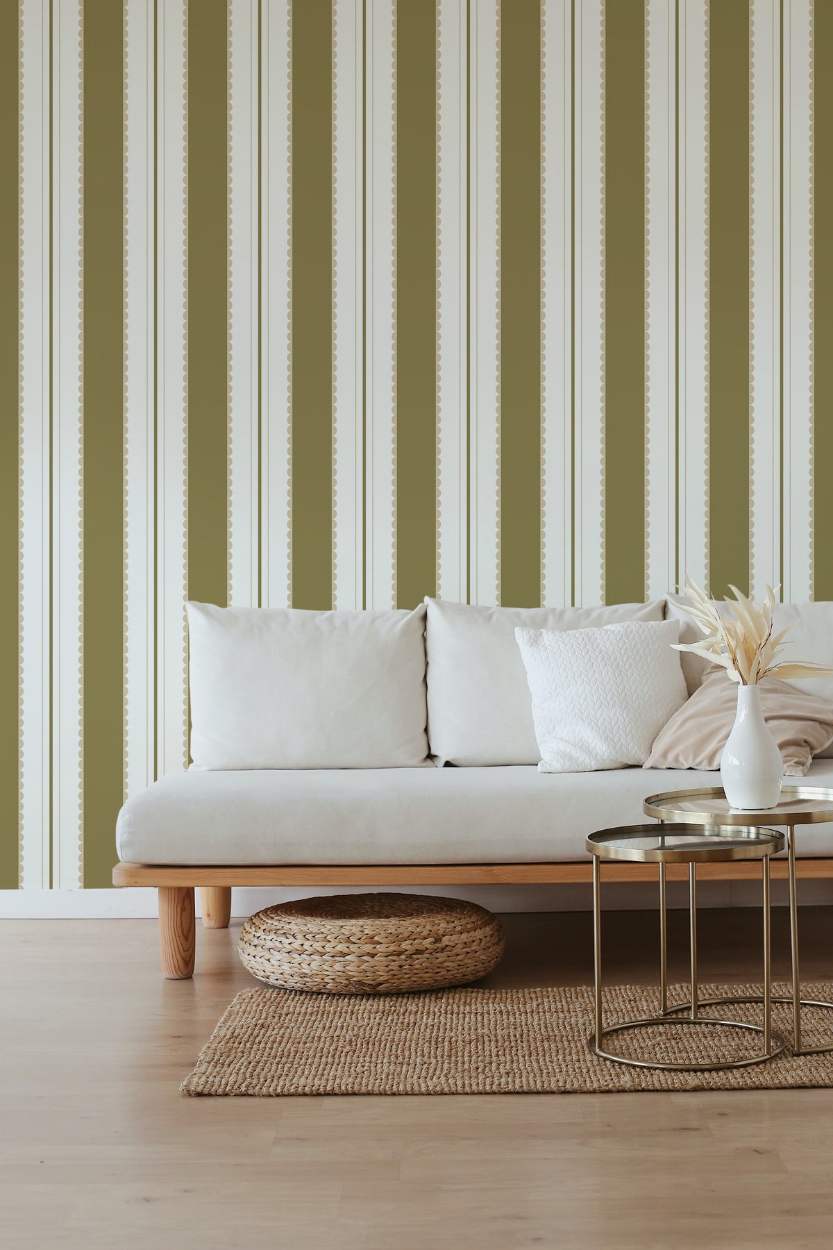 Scalloped Stripe Columns grasscloth wallpaper in a living room, with olive scalloped vertical stripes on white.