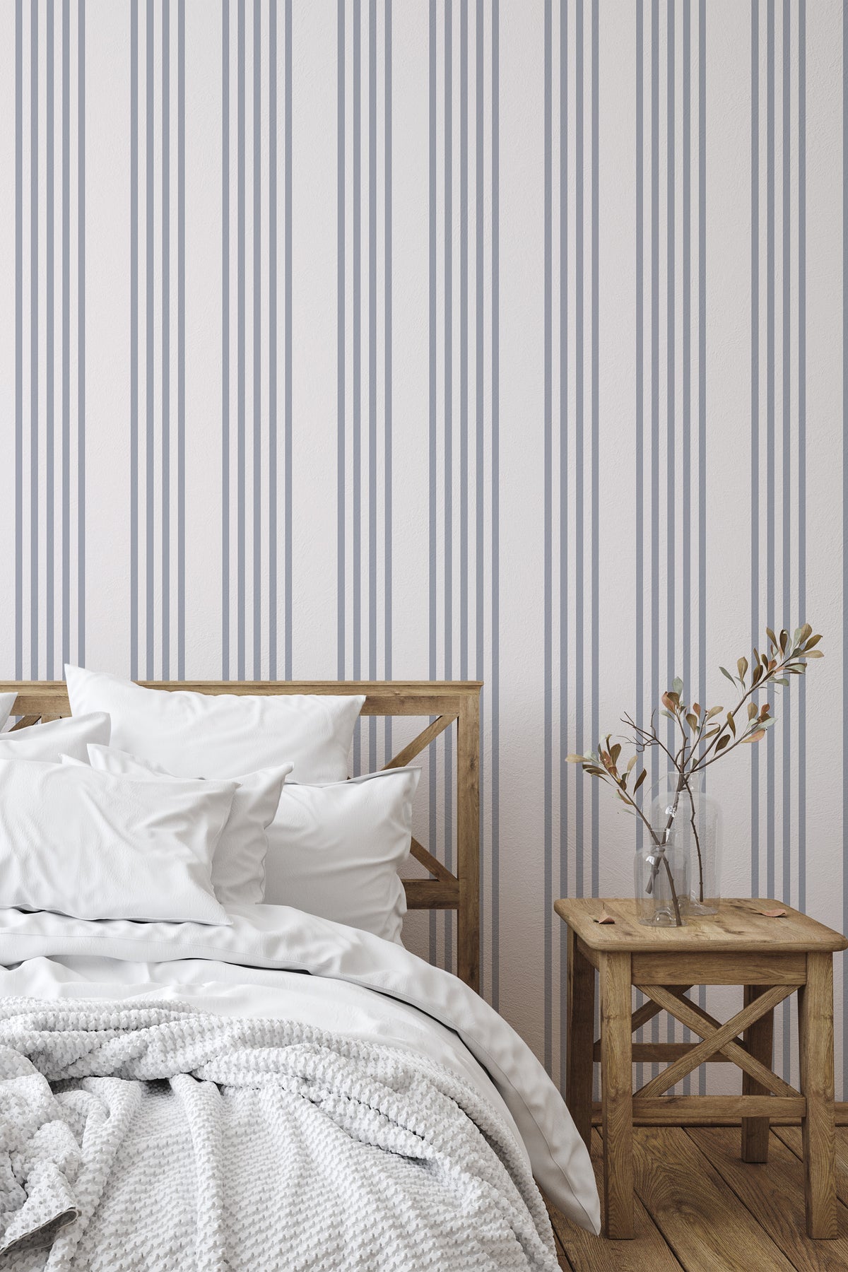 Classic Blue Pinstripes grasscloth wallpaper in a bedroom, vertical blush and blue-gray stripe pattern across the wall.