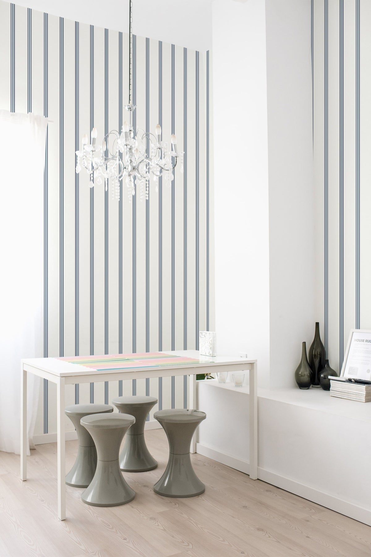 Classic Striped Columns self-adhesive wallpaper in a dining room, blue and white vertical stripes on full walls.