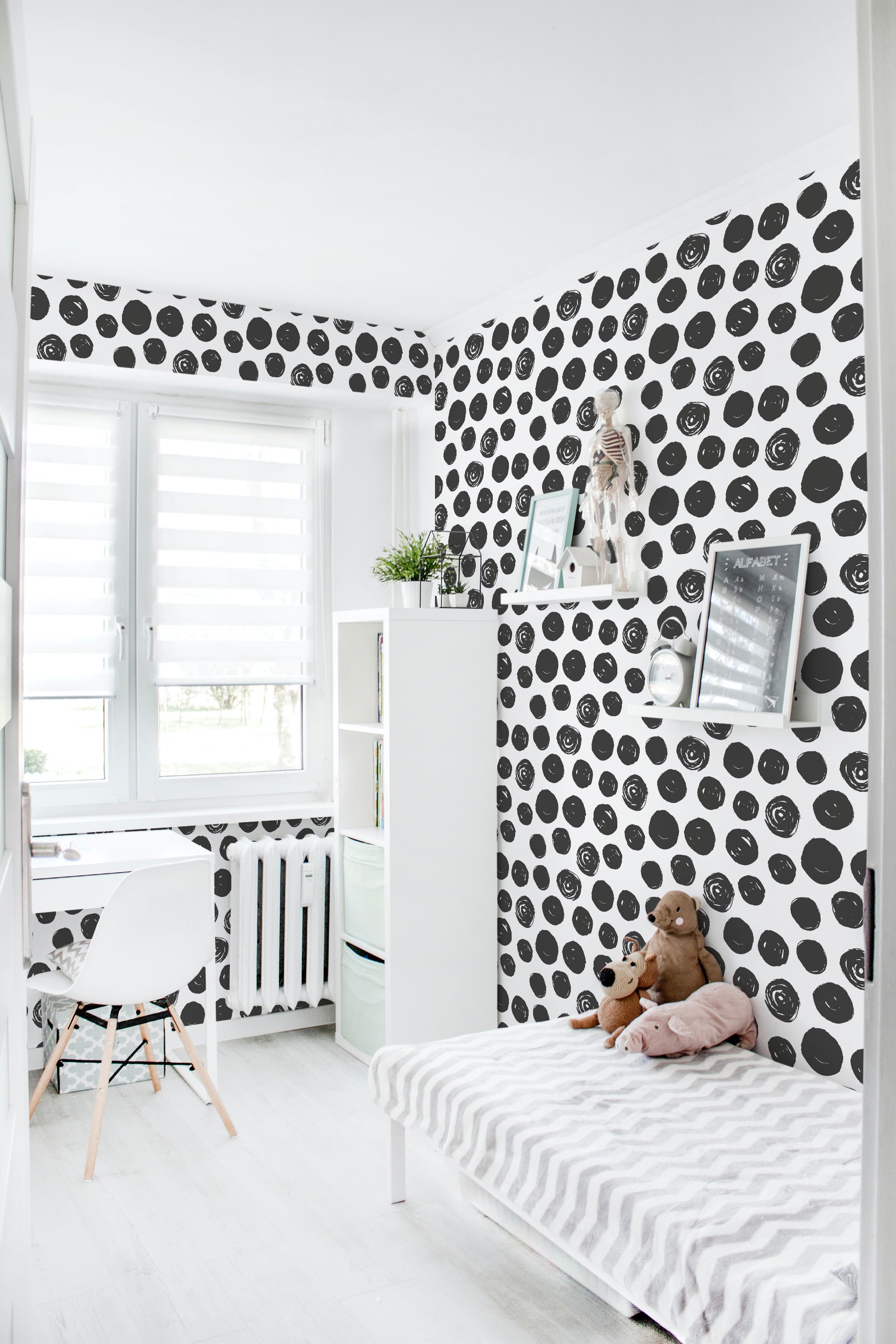 Room with black brushstroke dots on white wallpaper, creating a playful and modern pattern in a small, cozy space. Traditional wallpaper.