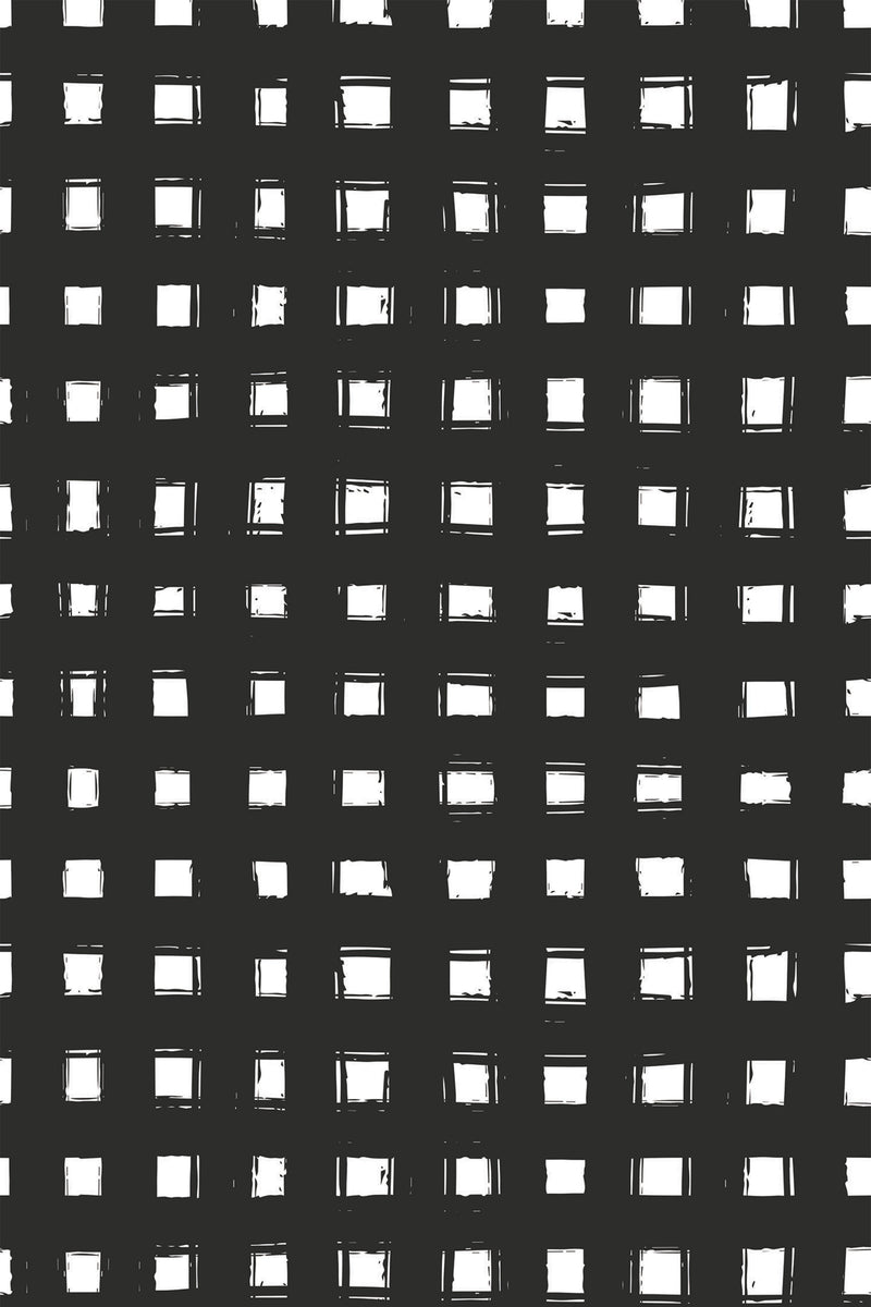 A hand-painted grid pattern in black, with slightly uneven lines creating squares on a white background. Peel and stick removable wallpaper.