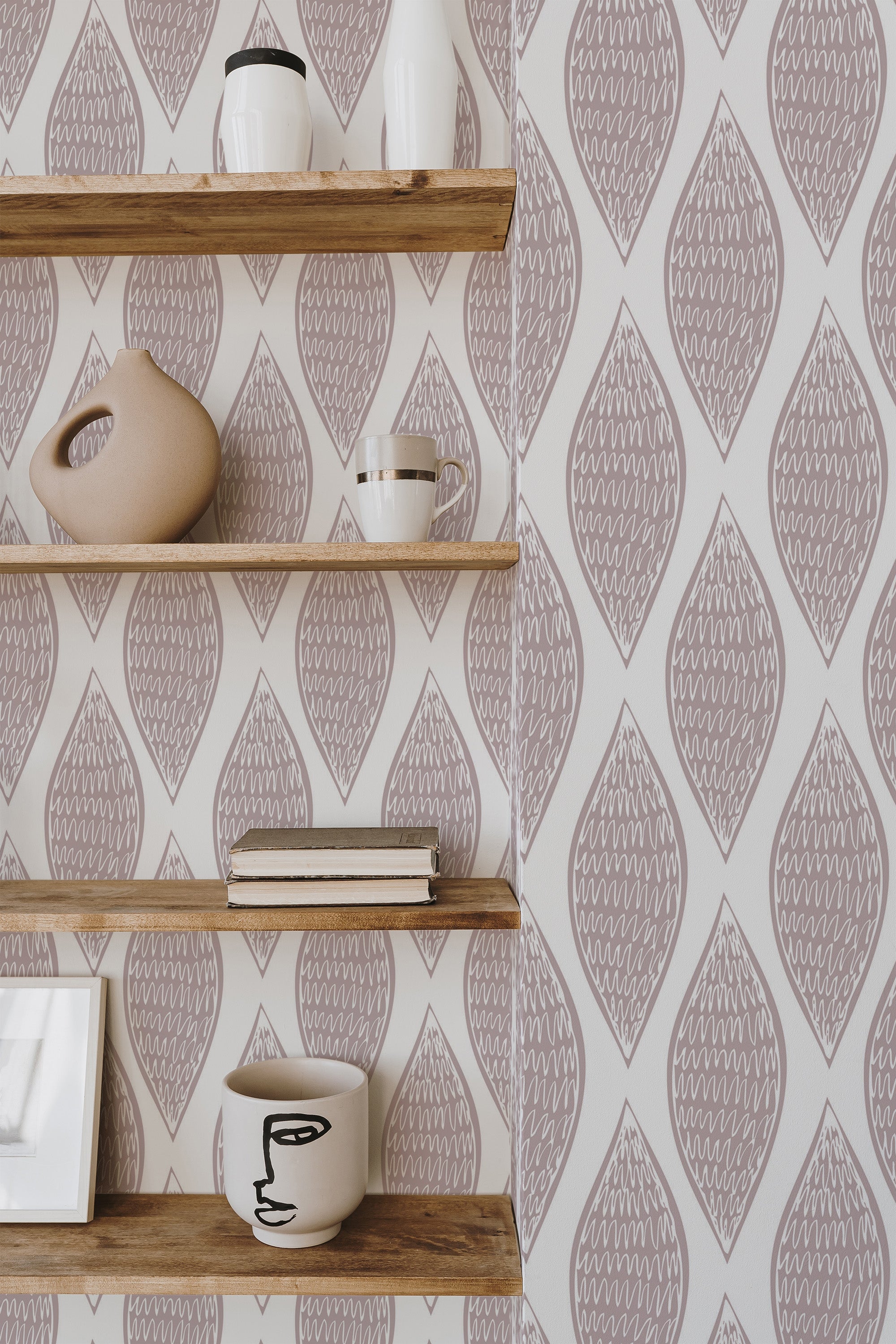 Self-adhesive wallpaper with a seamless leaf pattern in soft, earthy tones and abstract line details, adding a natural, stylish accent to the room.