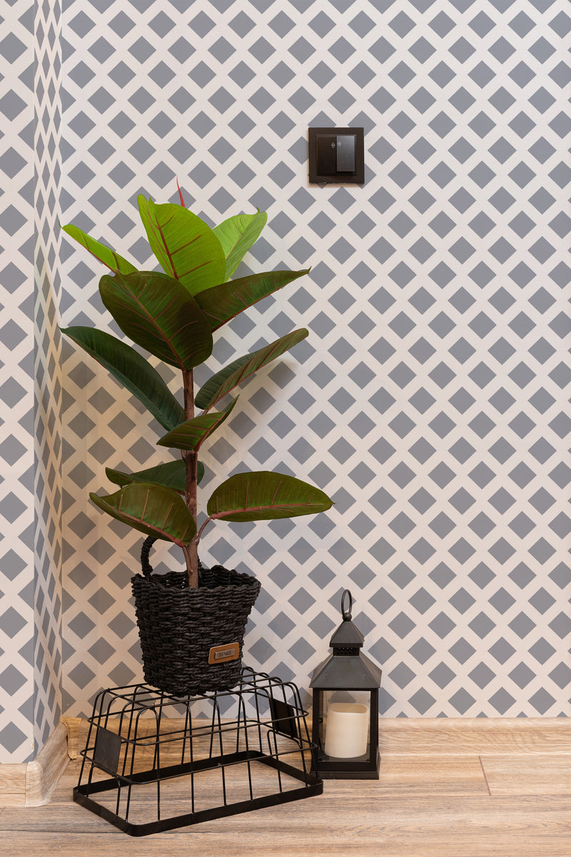 Self-adhesive wallpaper with a white and gray geometric square pattern design.