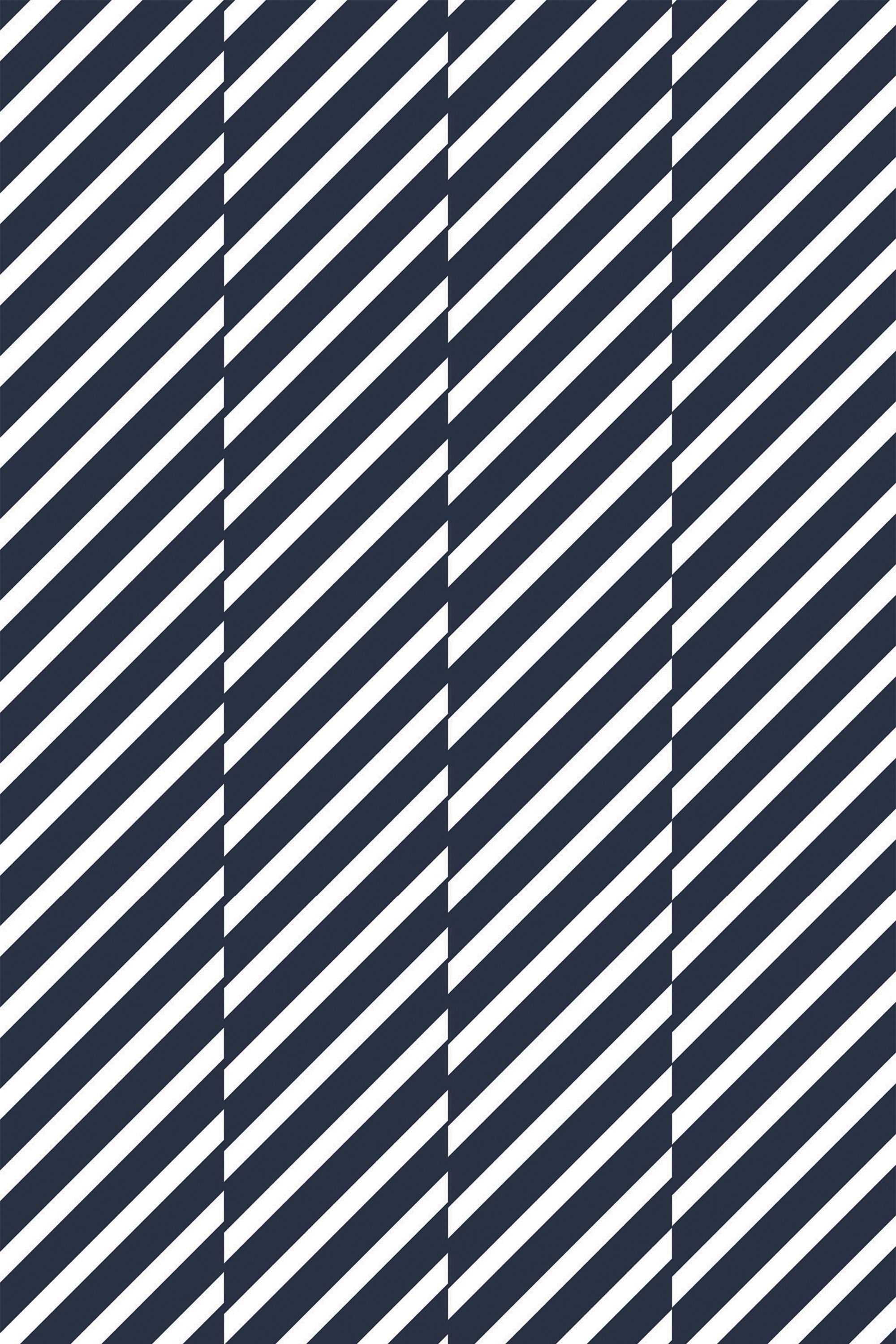 Diagonal alternating navy blue and white stripes in a repetitive pattern inspired by sailor uniforms, peel and stick removable wallpaper.