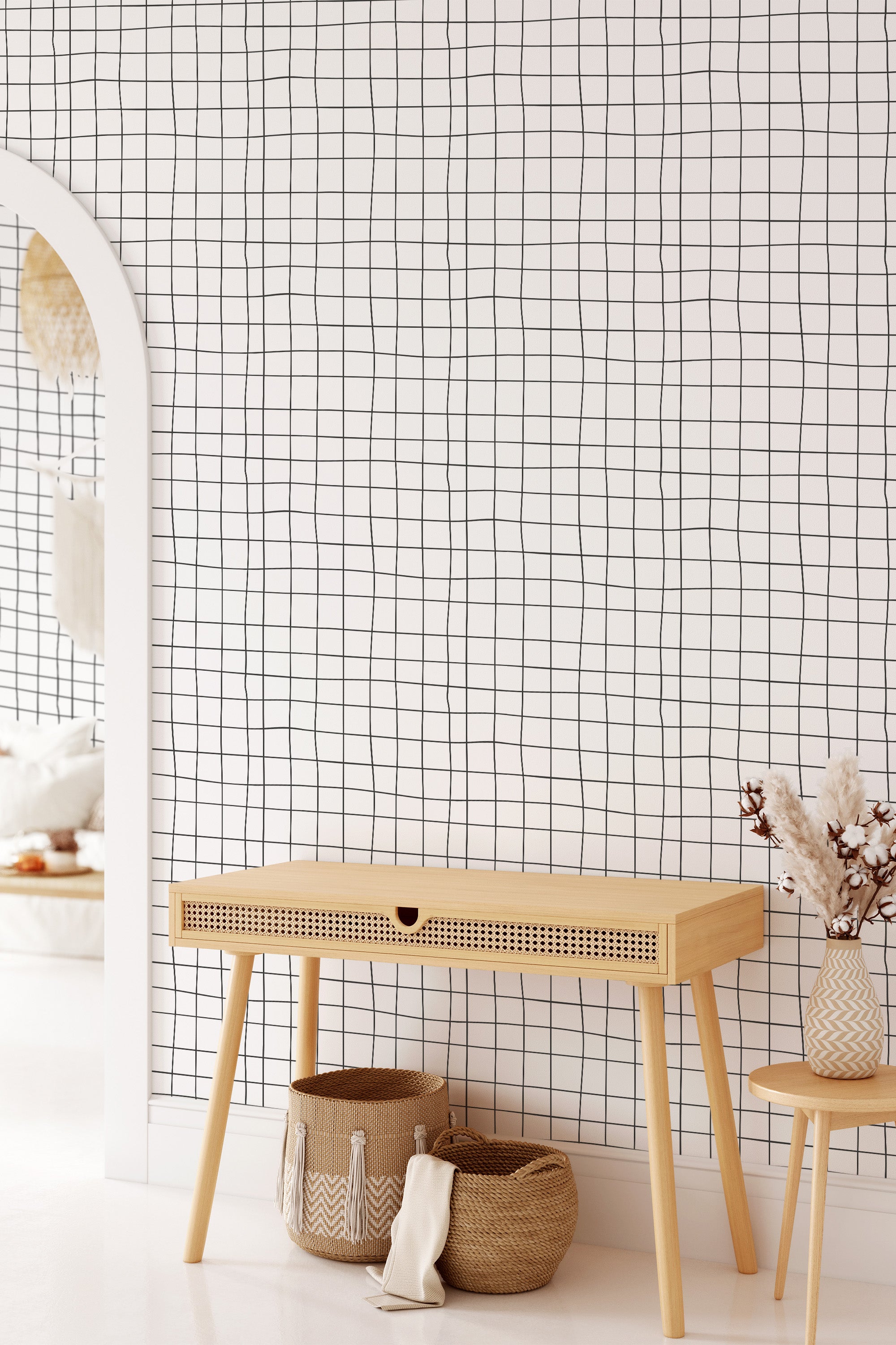 Wallpaper with a pattern of irregular black intersecting horizontal and vertical lines on a white background, creating a grid-like design. Traditional wallpaper.