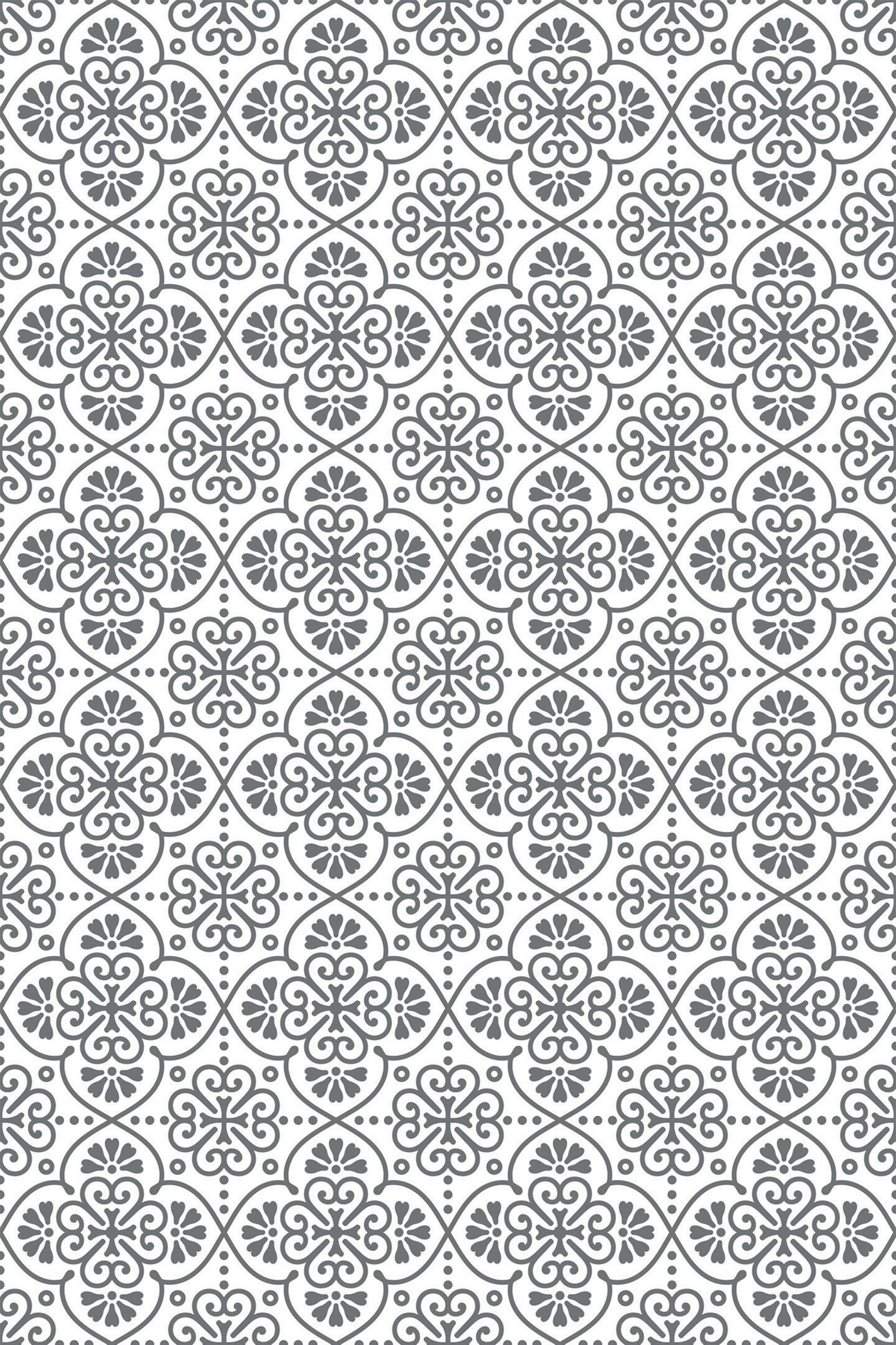 Intricate Moroccan-inspired pattern with symmetrical motifs in grey on a white background, creating a repeating geometric design. Peel and stick removable wallpaper.