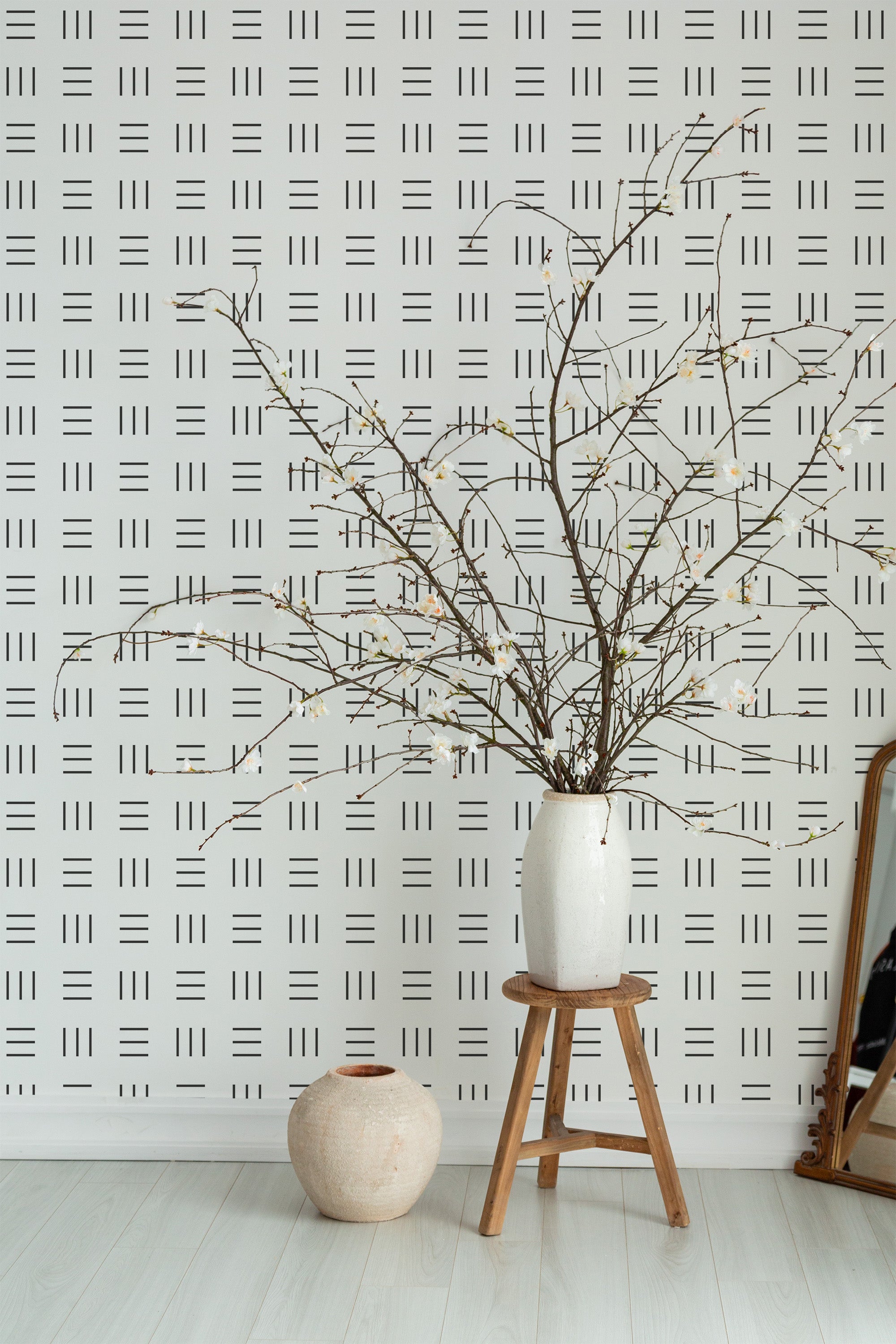 Self-adhesive wallpaper with a geometric line stripe pattern in black against a light background, creating a minimalist and modern aesthetic. The design consists of various parallel and perpendicular lines arranged systematically.