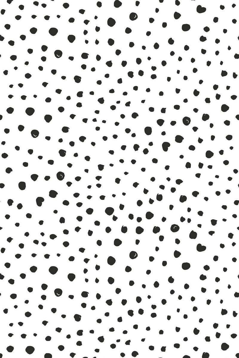 Black irregular dots of varying sizes scattered on a white background, peel and stick removable wallpaper.