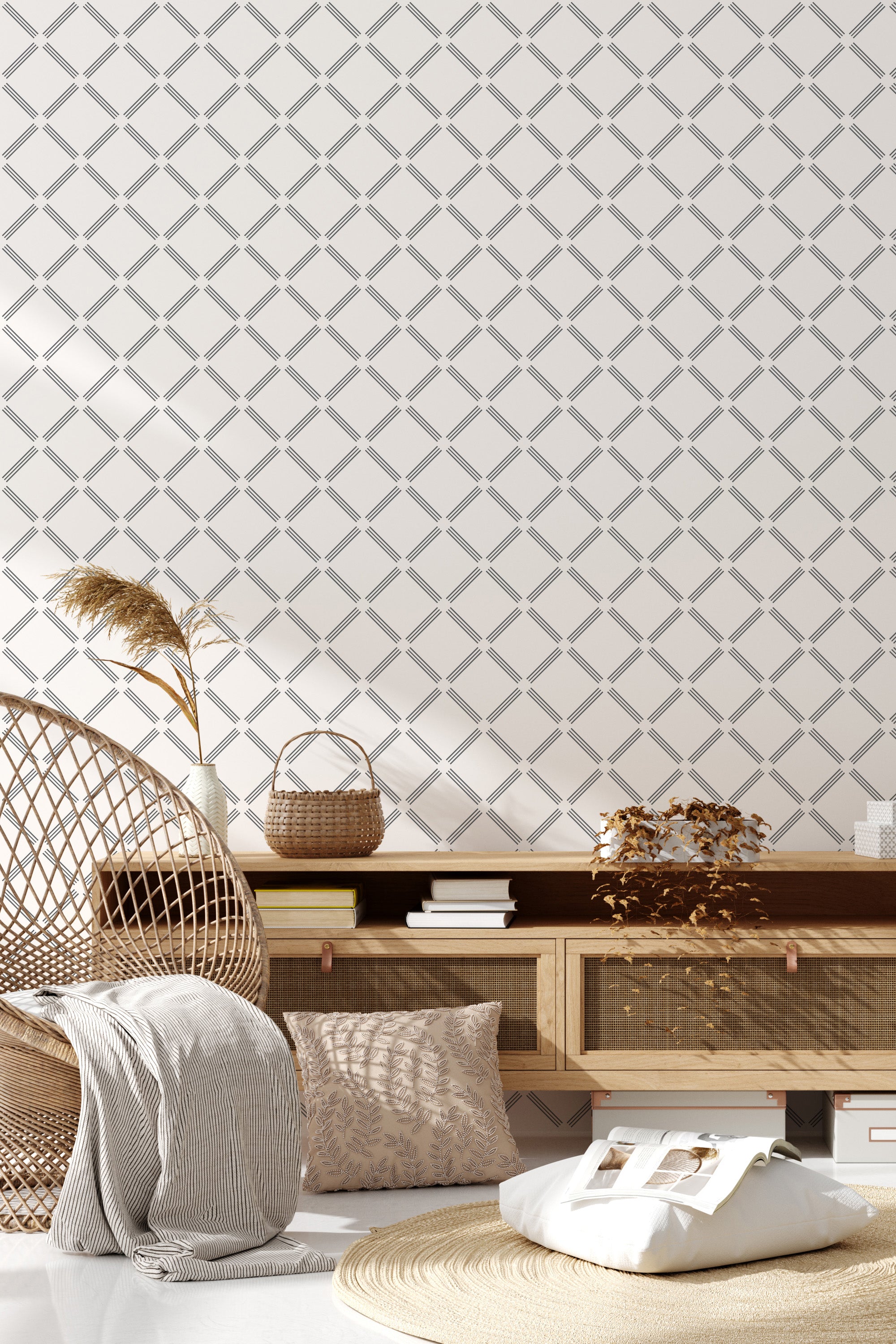 The wallpaper has a simple, repeating geometric pattern of small, dark grey lines forming diamond shapes on a white background, creating a clean and modern yet timeless look reminiscent of traditional wallpaper.