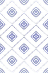 A repeating pattern of blue diamond shapes with intricate floral motifs and dotted diagonal lines on a white background. Peel and stick removable wallpaper.