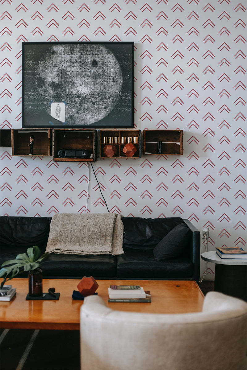Wallpaper with a pattern of upward-pointing red arrows evenly spaced on a white background, creating a simple geometric design, traditional wallpaper.