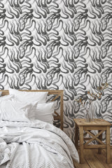 Self-adhesive wallpaper with a pattern of intricate black dots and flowing lines creating abstract, snake-like shapes on a white background.