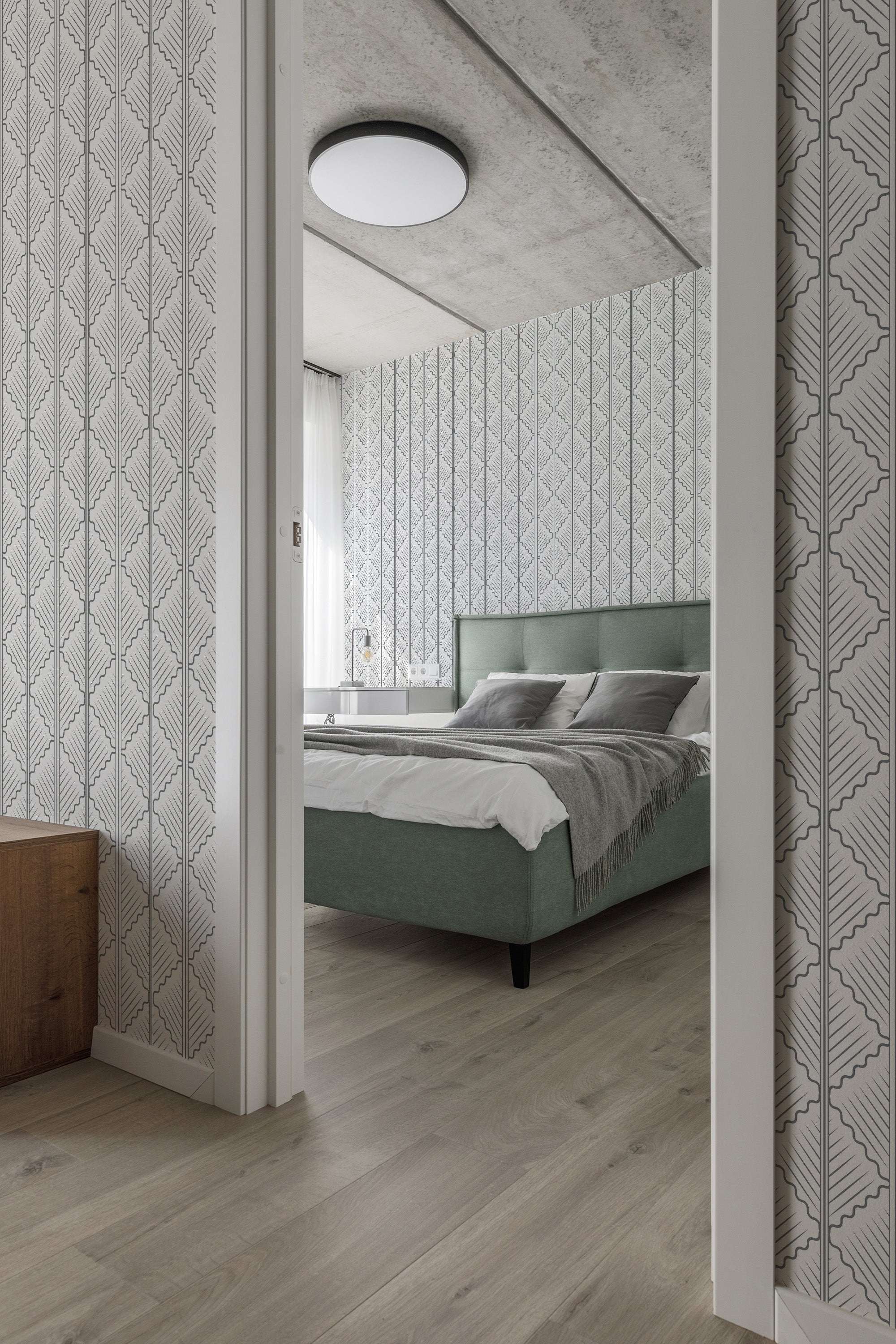 The room has light-colored walls adorned with a Quatrefoil design, featuring symmetrical, interlocking shapes that create a classic and elegant pattern on the traditional wallpaper.