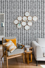 living room cozy sofa armchair pillows decor brush stroke arrows peel stick wallpaper