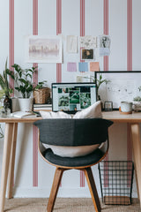 Self-adhesive French stripes wallpaper with alternating red and white vertical lines on a smooth white background.