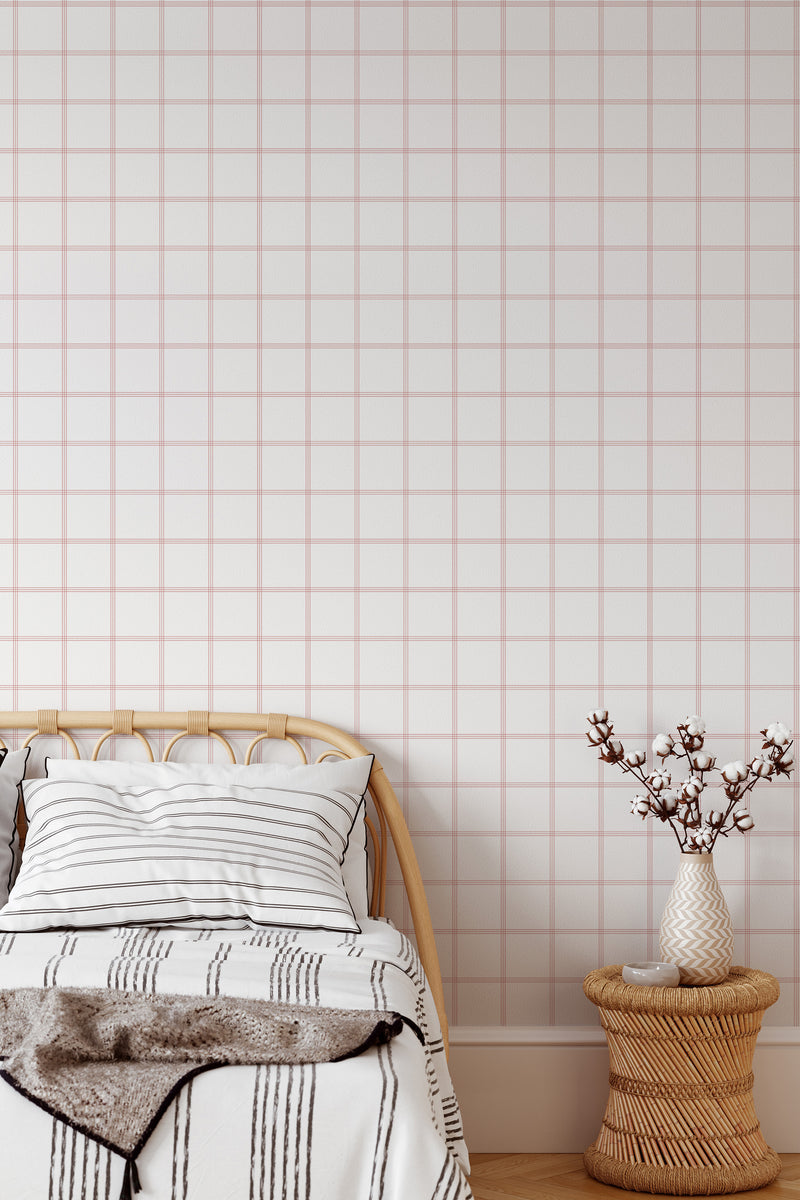 Self-adhesive plaid wallpaper with a grid pattern in soft pastel colors on a white background, creating a subtle and cozy look in the room.