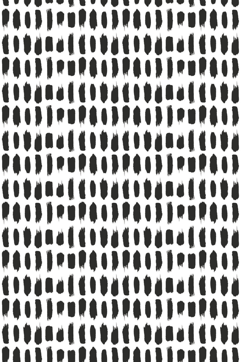 Black irregular brushstroke dots are arranged in a grid pattern on a white background, creating a minimalist, modern design. Peel and stick removable wallpaper.