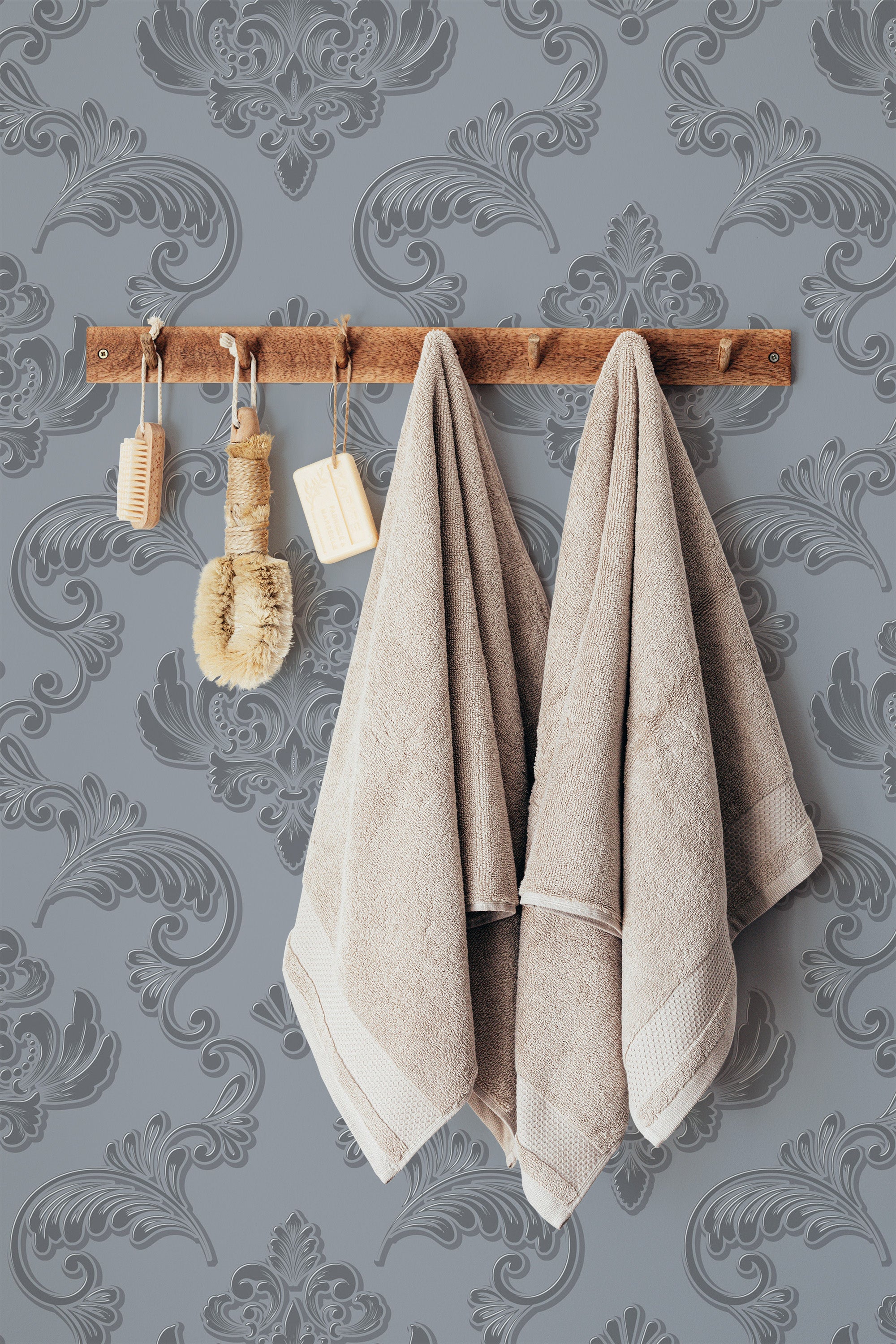 Self-adhesive wallpaper in a Damask Victorian design with intricate, symmetrical patterns in shades of grey, adding a vintage and elegant touch to the room.