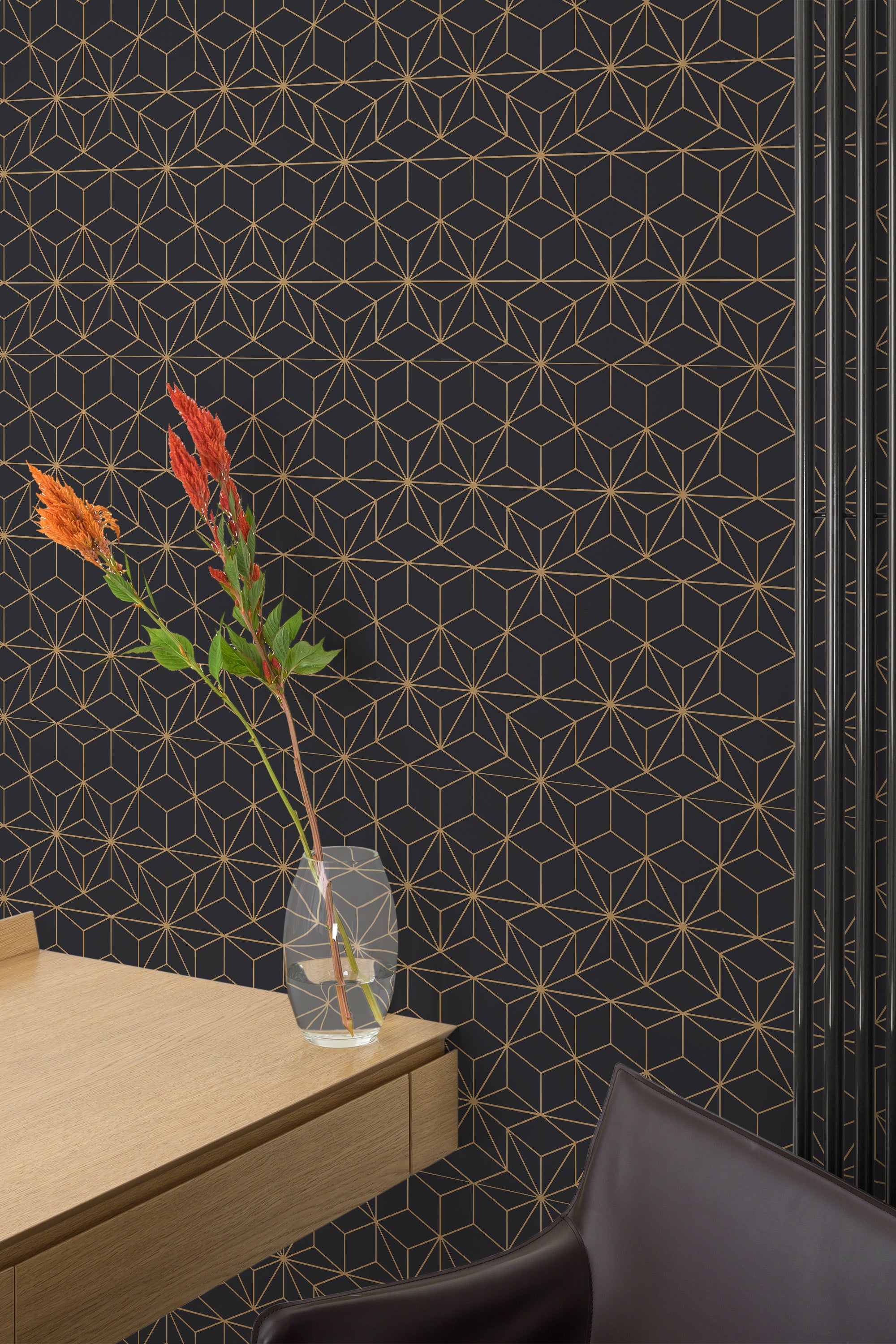 Self-adhesive luxury wallpaper in a black and gold geometric pattern with interlocking, gold-outlined cubes, creating a sophisticated and modern look.