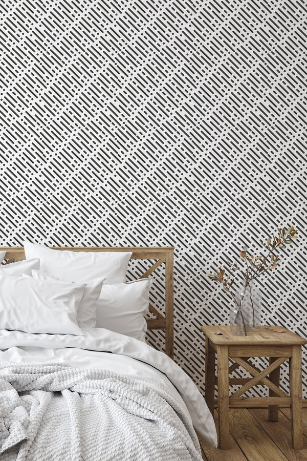 simple bedroom bed nightstand decorative vase memphis pattern wall decor