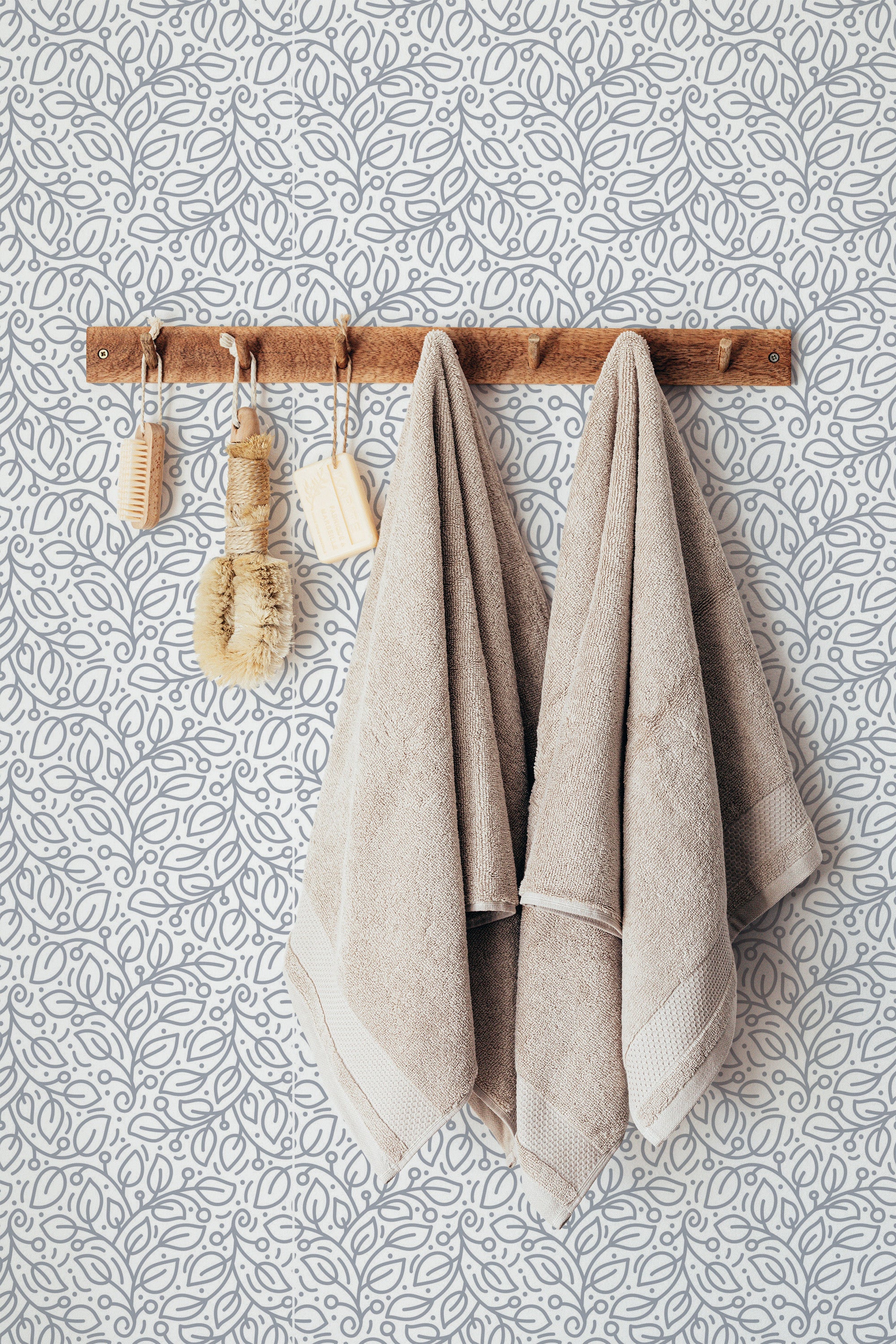 Self-adhesive Seamless Leaf wallpaper with a gray leaf pattern on a white background, adding a natural and elegant touch to the room.