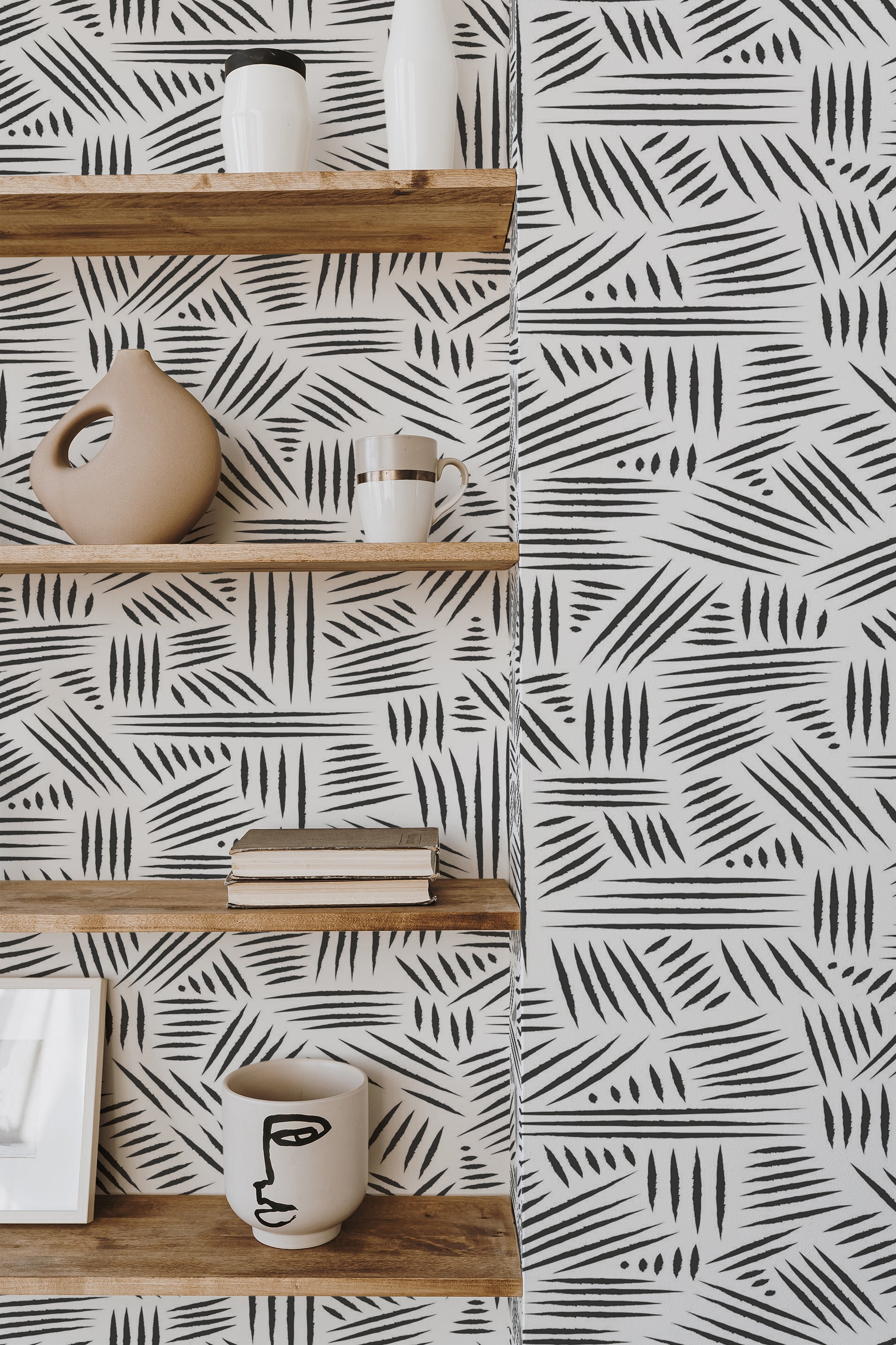 Self-adhesive wallpaper pattern with irregular black short lines and dots forming a modern, abstract design on a white background.