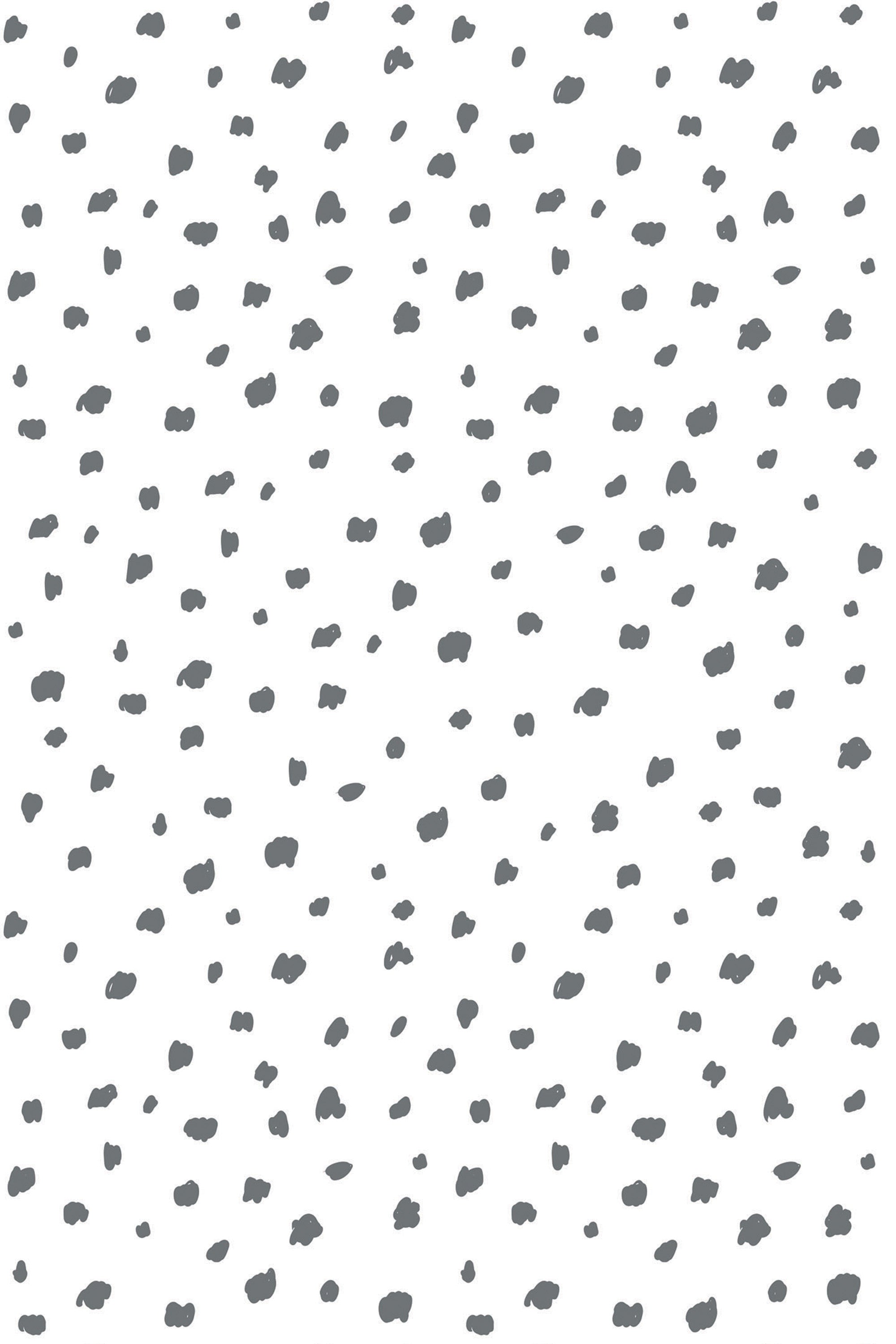 Dark irregular paint circles scattered across a white background, creating a minimalist and abstract pattern, peel and stick removable wallpaper.