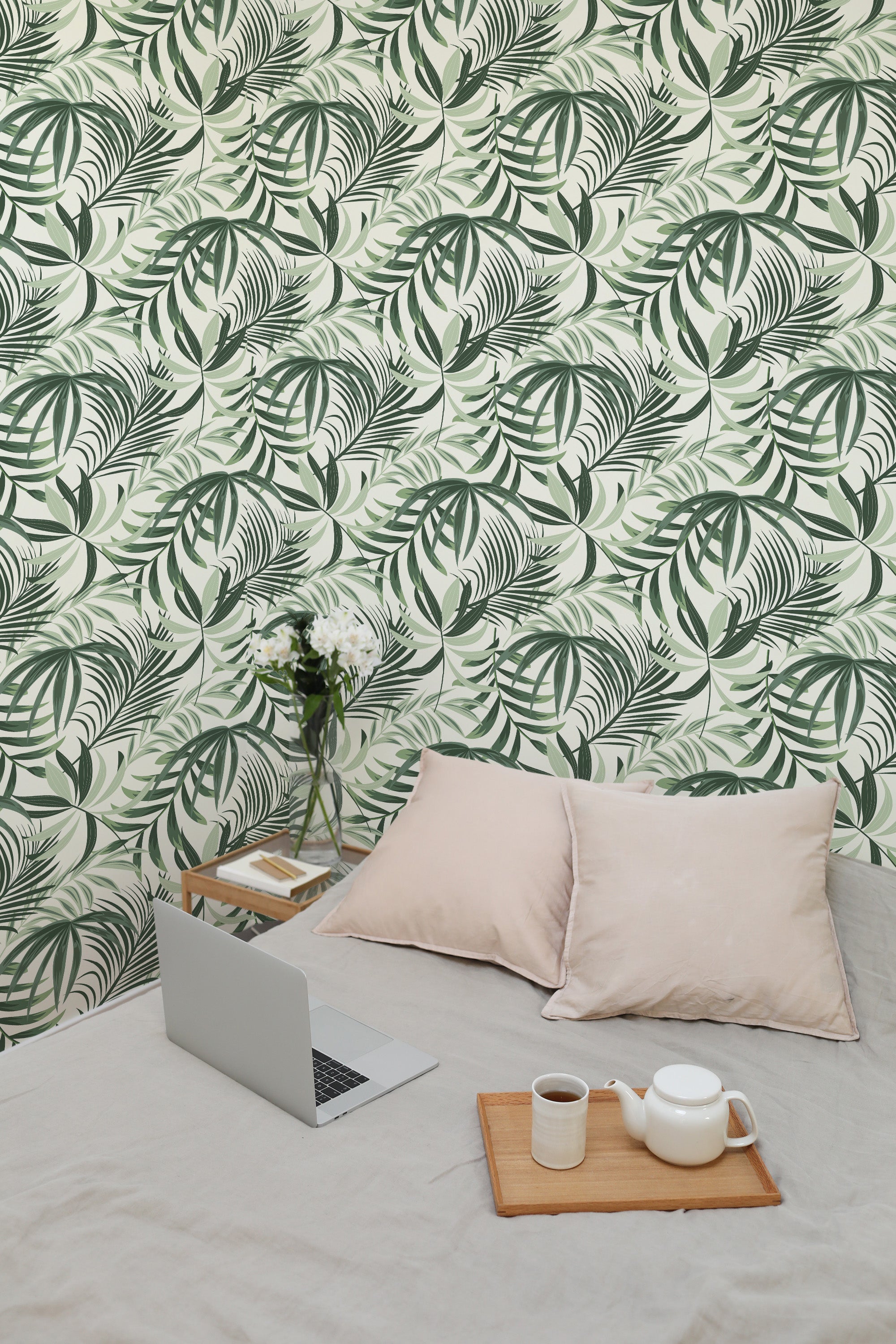 Self-adhesive wallpaper with a Green tropical leaf design. The wallpaper showcases lush green palm leaves with intricate details, creating a vibrant and calming atmosphere.