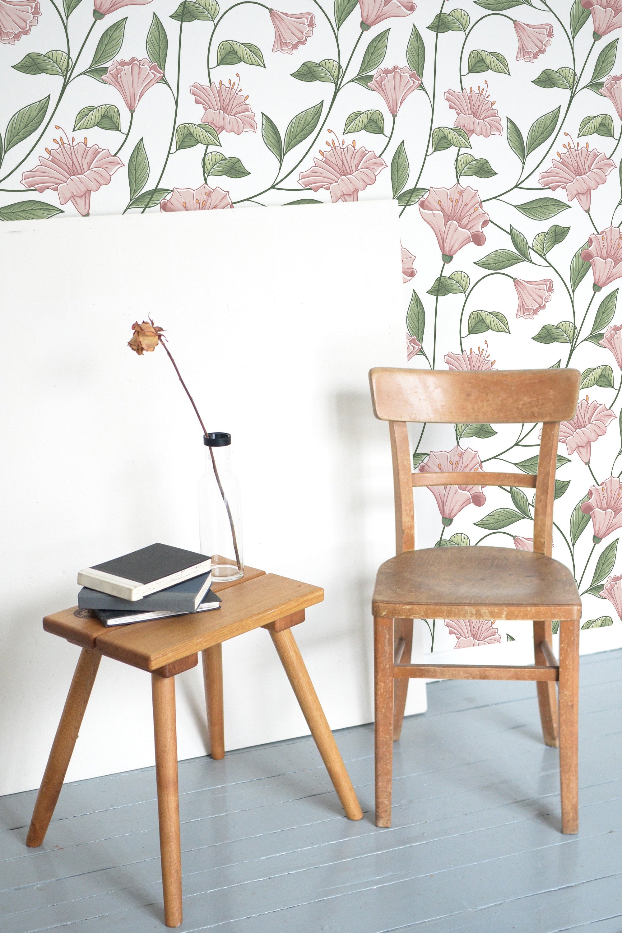 Self-adhesive wallpaper with a girly floral design, featuring pink flowers and green leaves cascading in a natural, delicate pattern against a light background.
