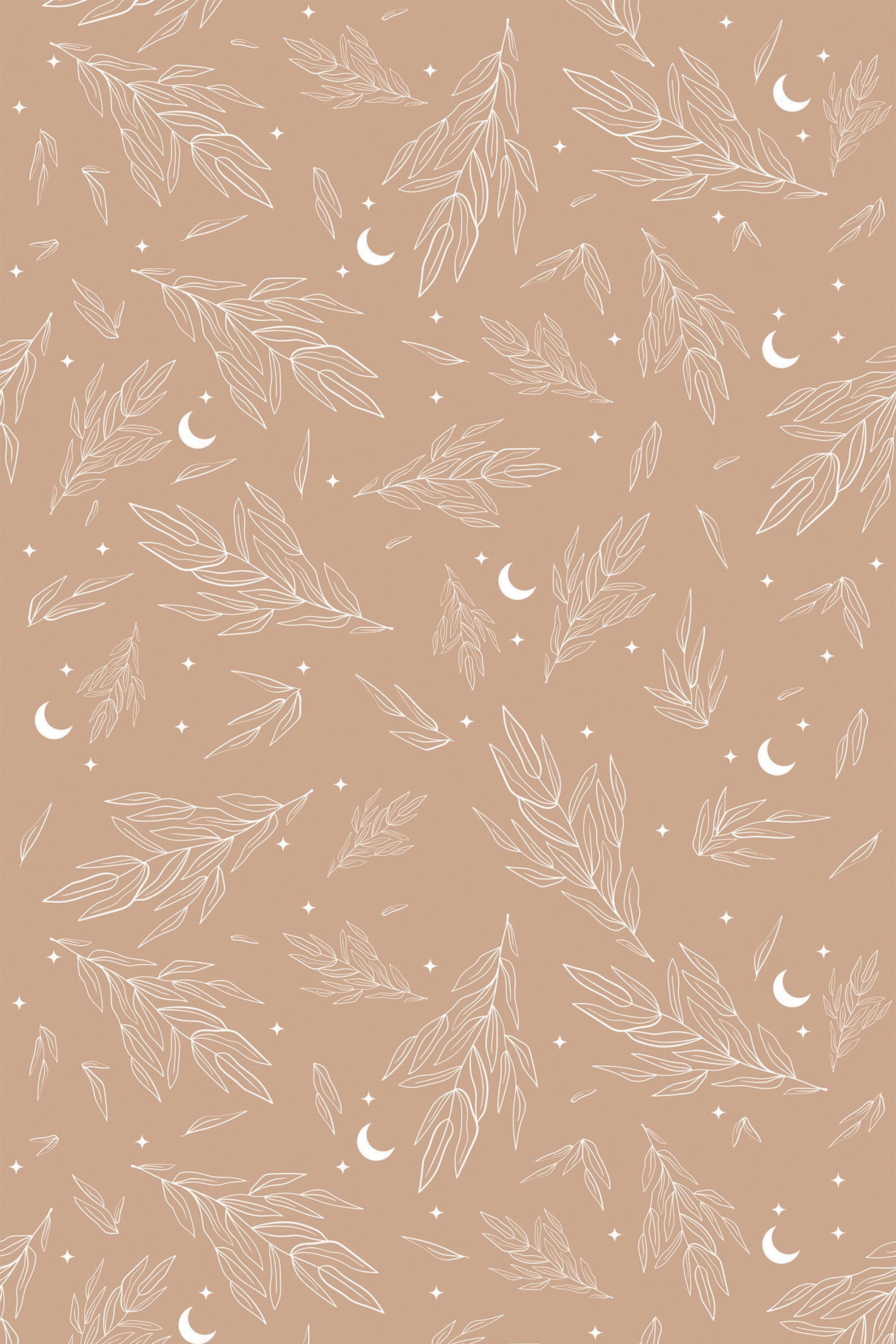 A soft brown background with white delicate outlines of leaves, crescent moons, and stars scattered throughout, peel and stick removable wallpaper.