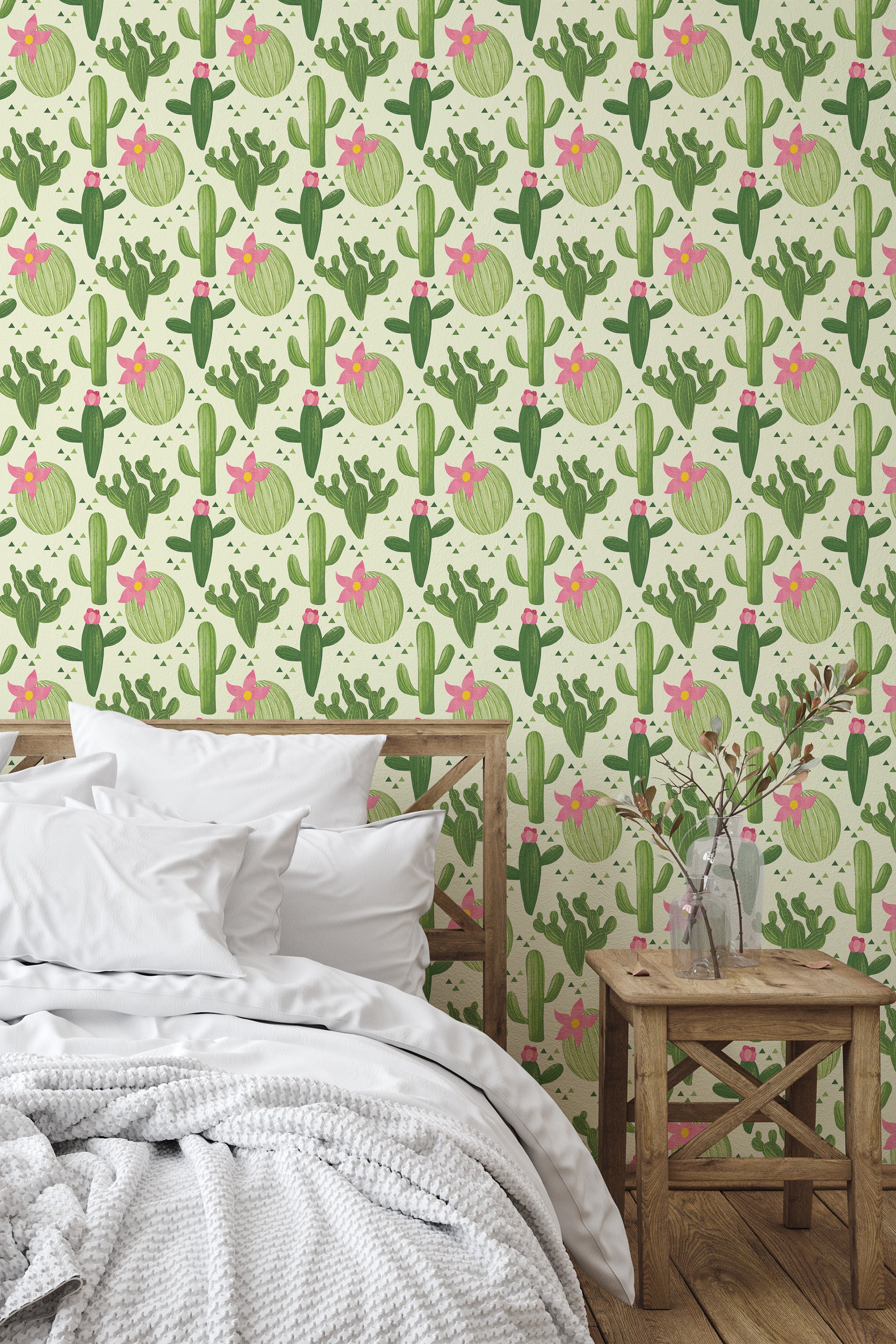 Self-adhesive cactus pattern wallpaper with vibrant green cacti accented by pink flowers and light green circular elements on a cream background.