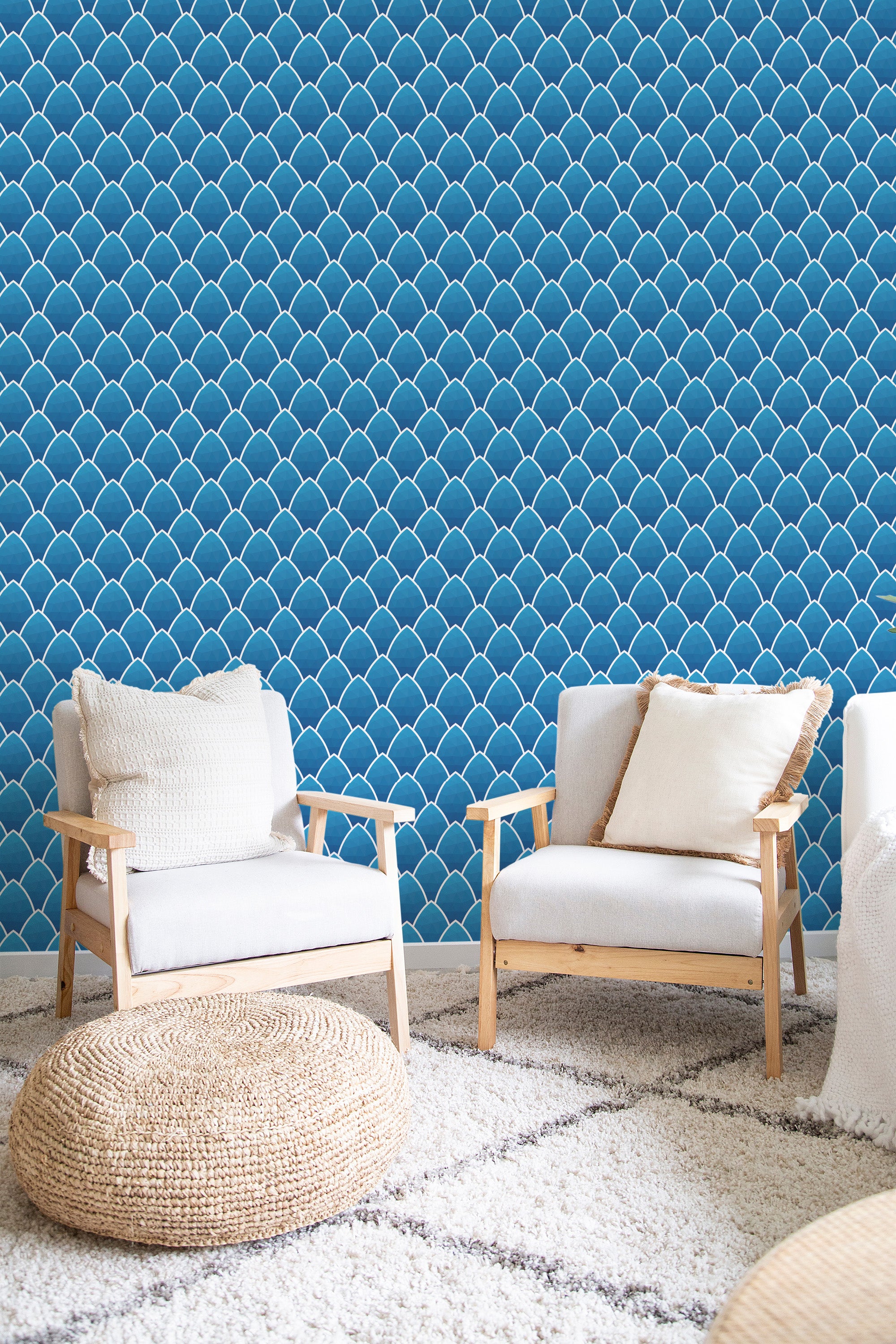 Blue seamless art deco wallpaper with a repetitive scalloped pattern resembling overlapping scales, creating a textured and elegant appearance suited for a traditional wallpaper.
