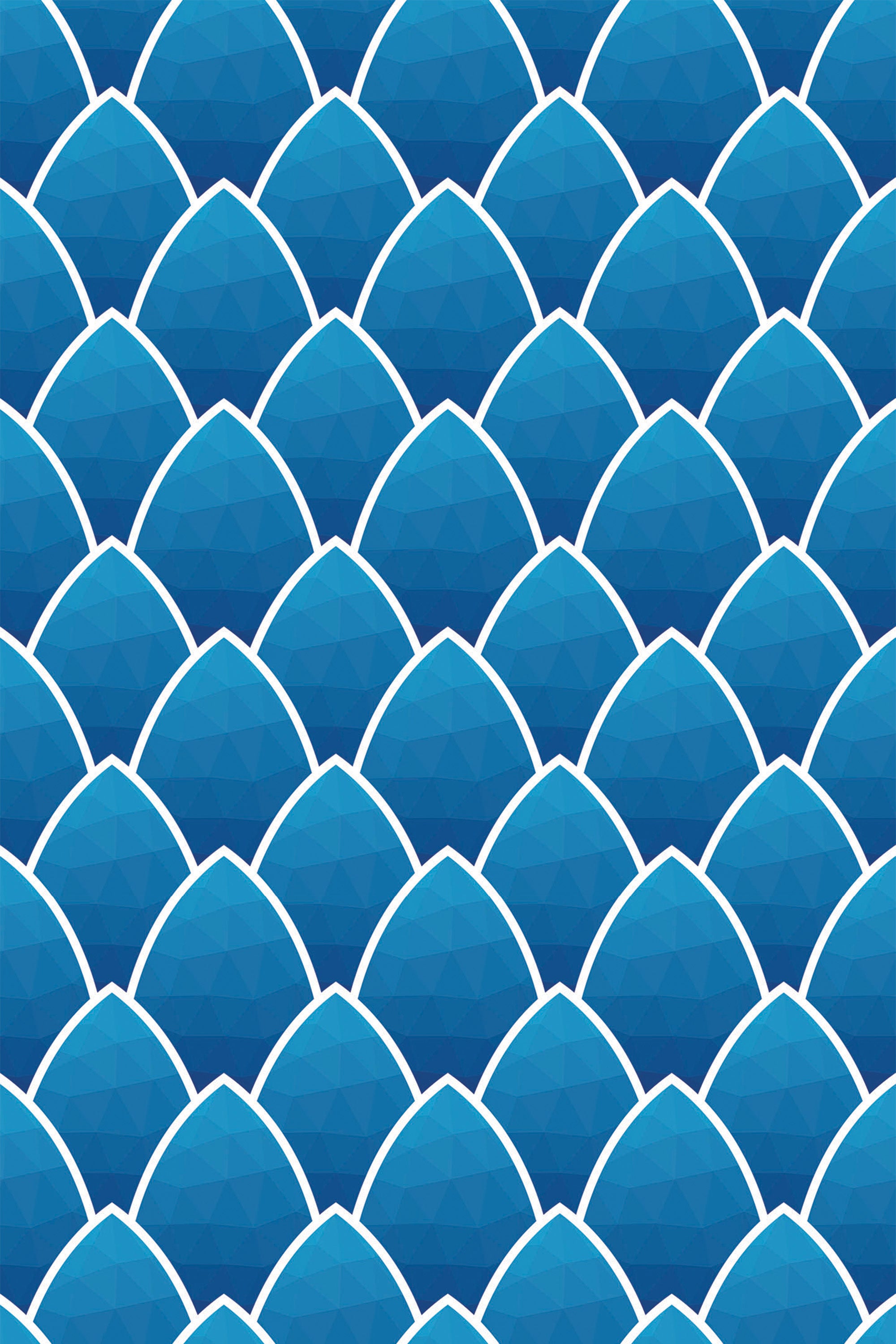 Blue seamless art deco wallpaper with a repeating pattern of overlapping scalloped shapes outlined in white, creating a geometric and modern design. Peel and stick removable wallpaper.