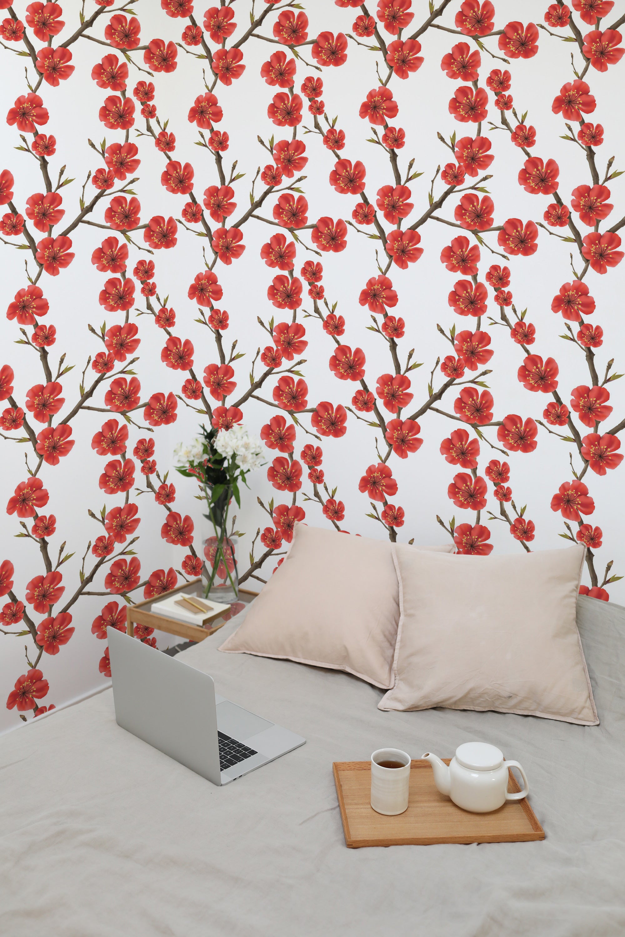 Self-adhesive wallpaper with a Spring flowers design, featuring vibrant red blossoms and green leaves on a white background.