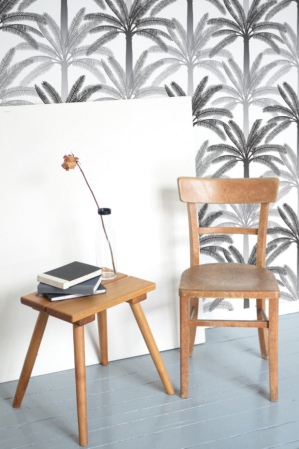 wooden table chair decorative plant blank canvas gray and black palm trees self adhesive wallpaper
