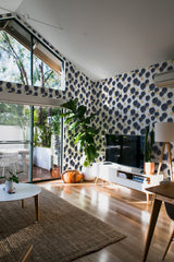 minimalist house terrace green plants living room big paint spots stick and peel wallpaper