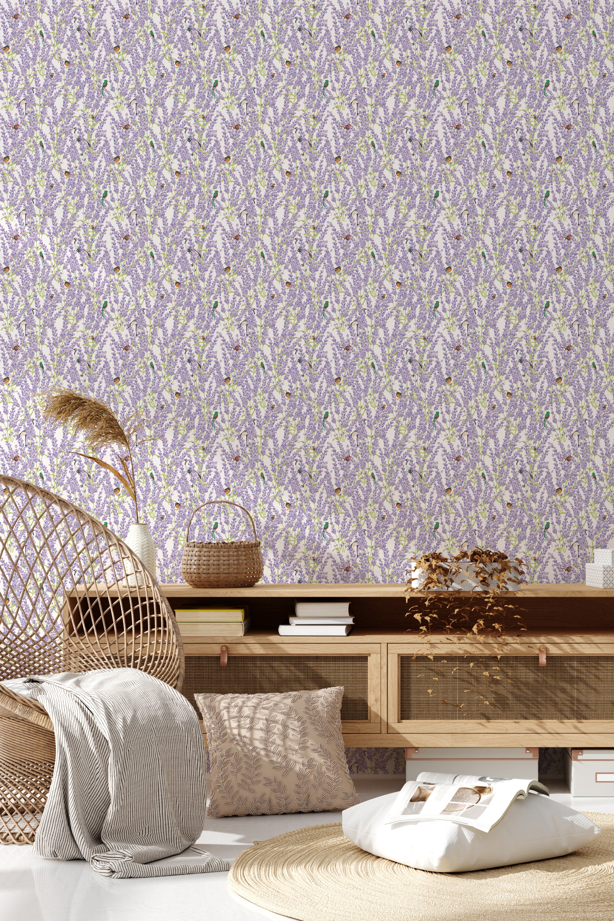 Wallpaper with delicate lavender shades, subtle bird motifs intertwined with floral patterns and foliage, creating a lively yet gentle atmosphere in the room. The intricate detailing contrasts softly with light and natural furniture elements, embodying a traditional wallpaper.