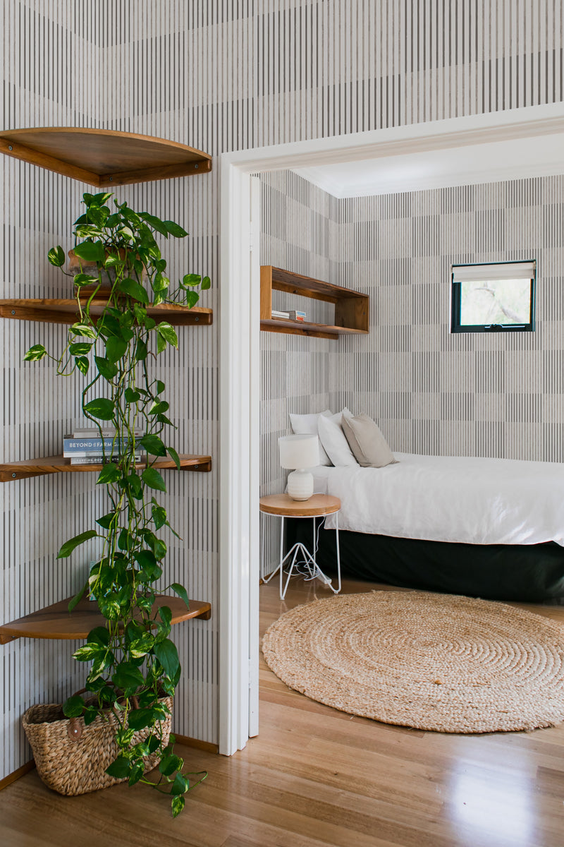 bedroom cozy interior green plants round carpet line chess peel & stick wallpaper