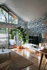 minimalist house terrace green plants living room vintage circle stick and peel wallpaper