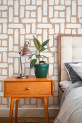 stylish bedroom interior nightstand plant lamp big brush stroke accent wall