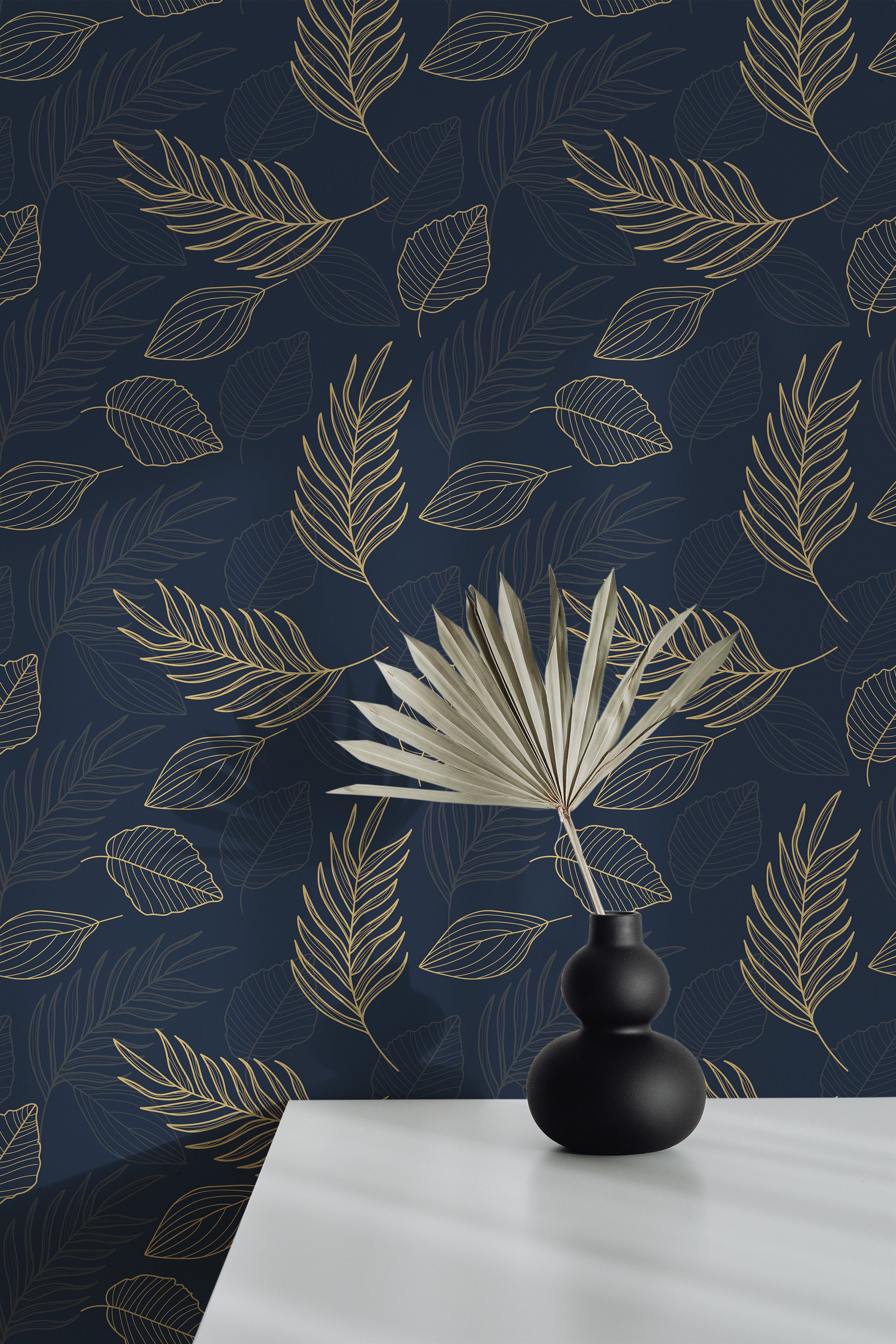 Self-adhesive wallpaper with a Golden leaf pattern on a dark blue background, featuring large, delicate leaves sketched in metallic gold tones.