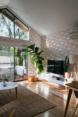minimalist house terrace green plants living room neutral cloud stick and peel wallpaper