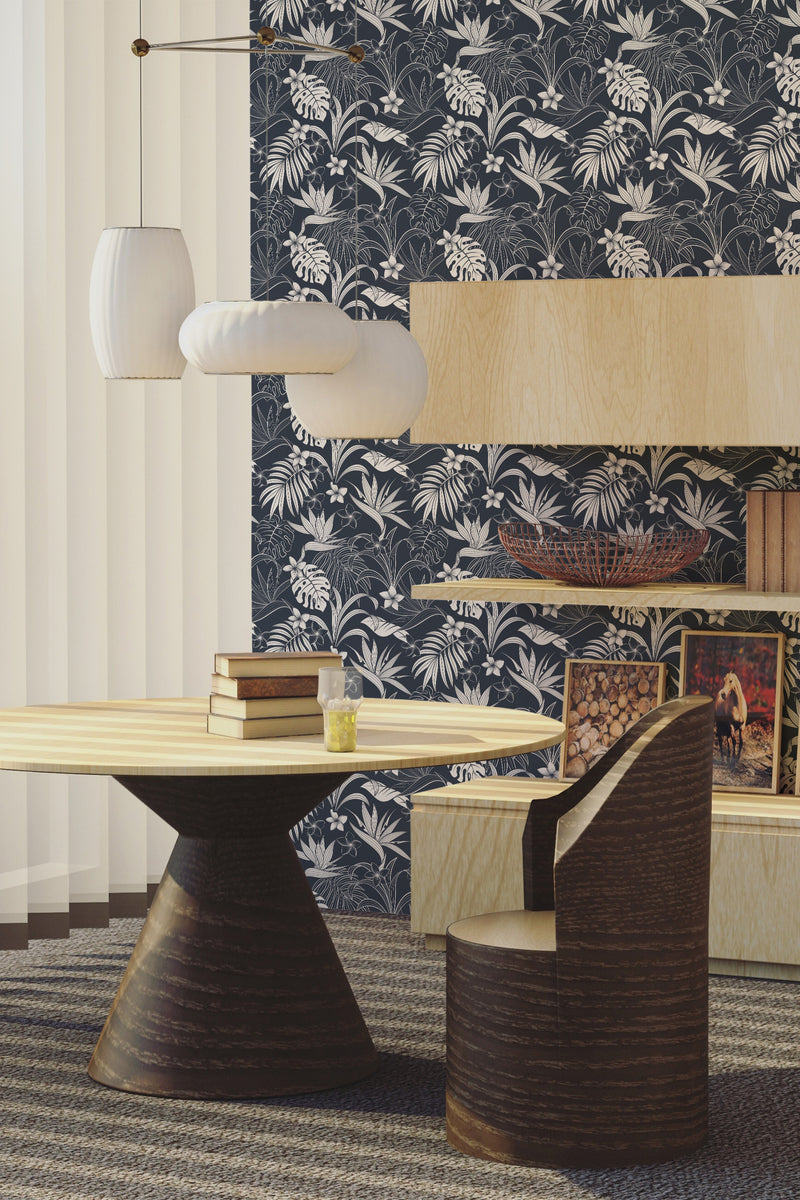 Dark palm tree patterned wallpaper with white tropical leaves and palm fronds set against a deep navy blue background. This is a traditional wallpaper.