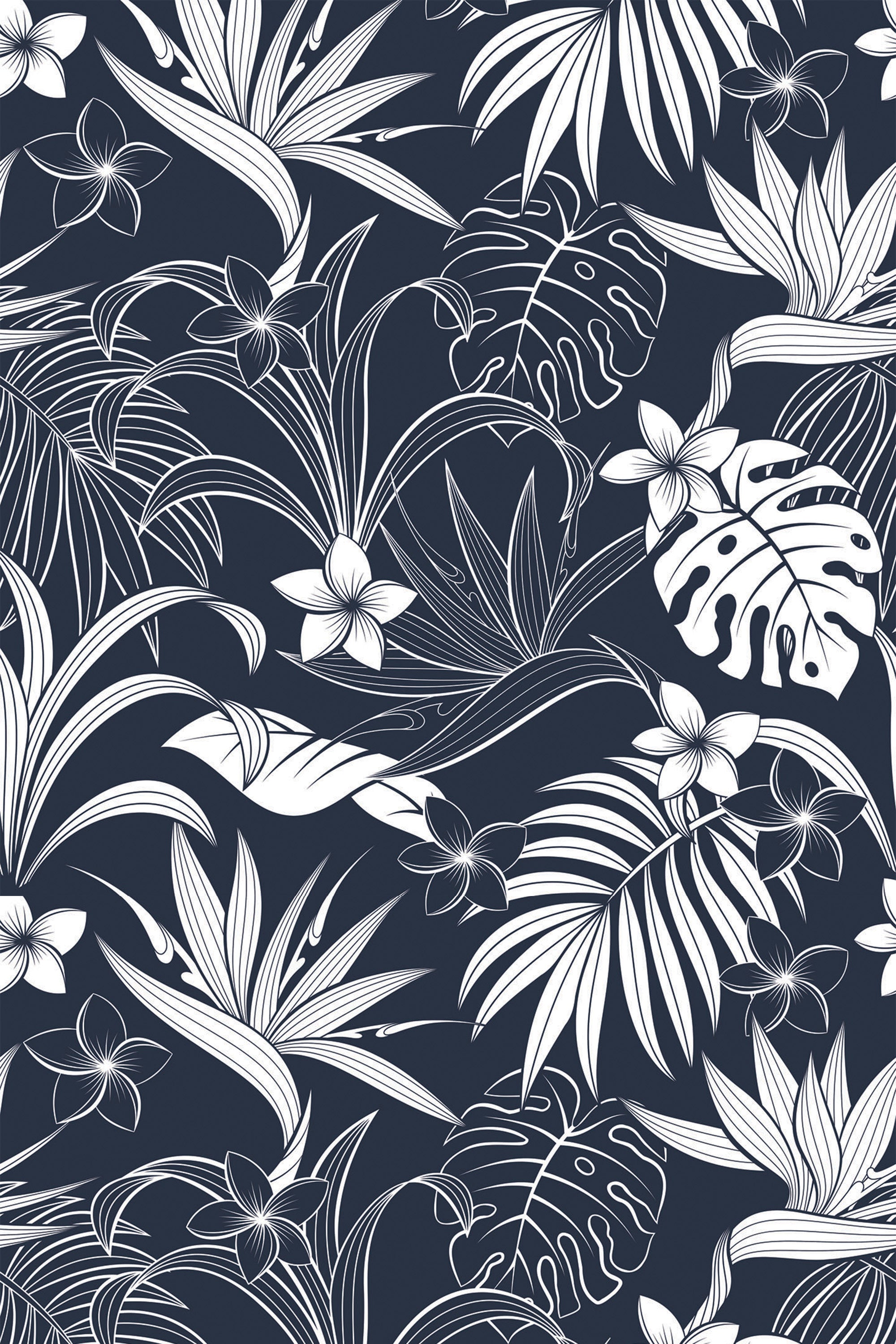 A dark wallpaper with intricate white palm tree leaves, tropical plants, and floral elements spread across a deep background. Peel and stick removable wallpaper.